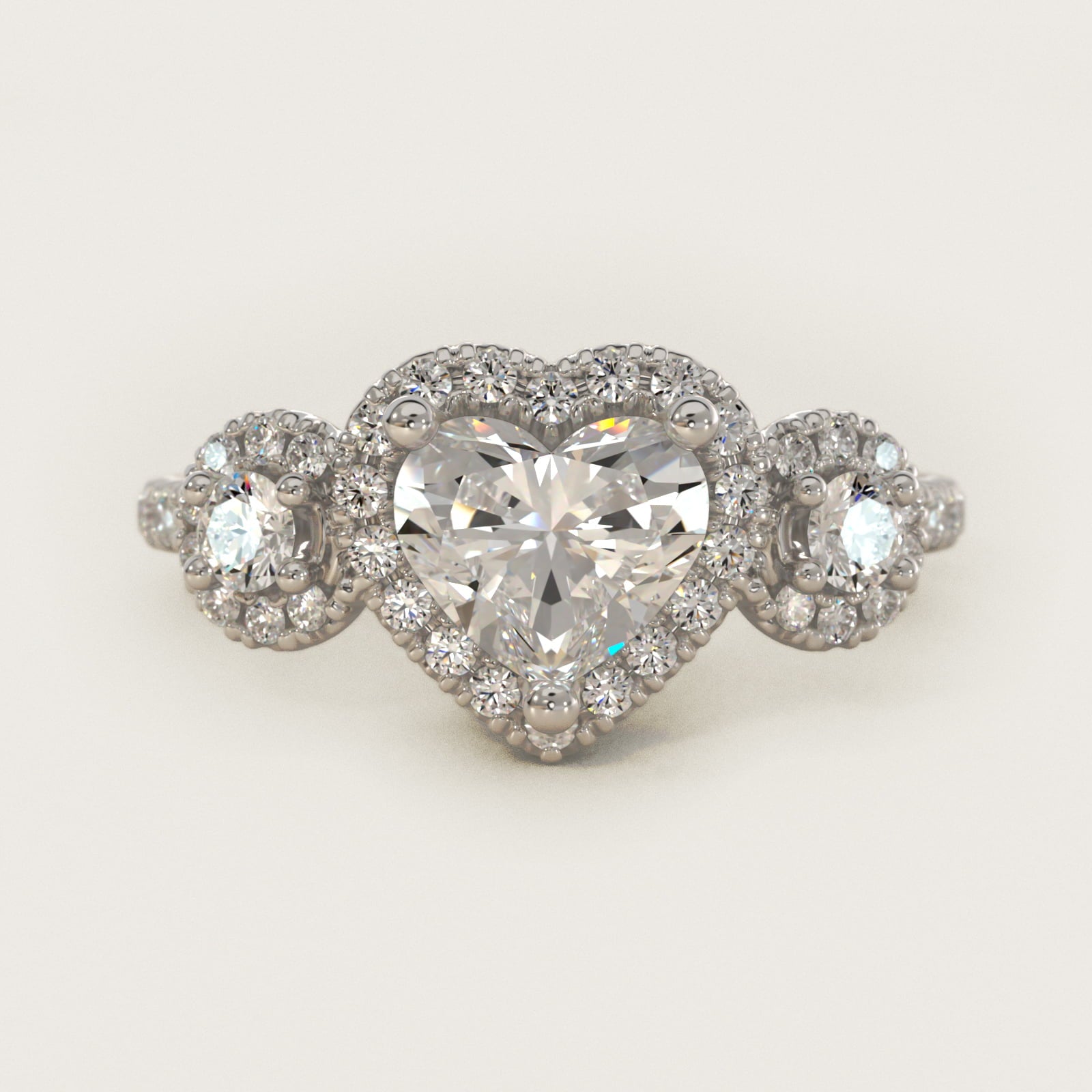 Three-Stone Halo Diamond Engagement Ring in Platinum - Heart Center