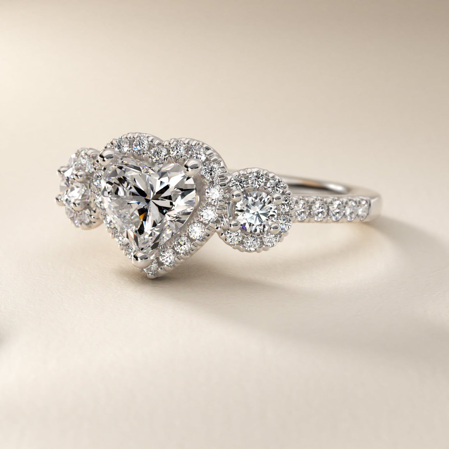 Three-Stone Halo Diamond Engagement Ring in Platinum - Heart Center