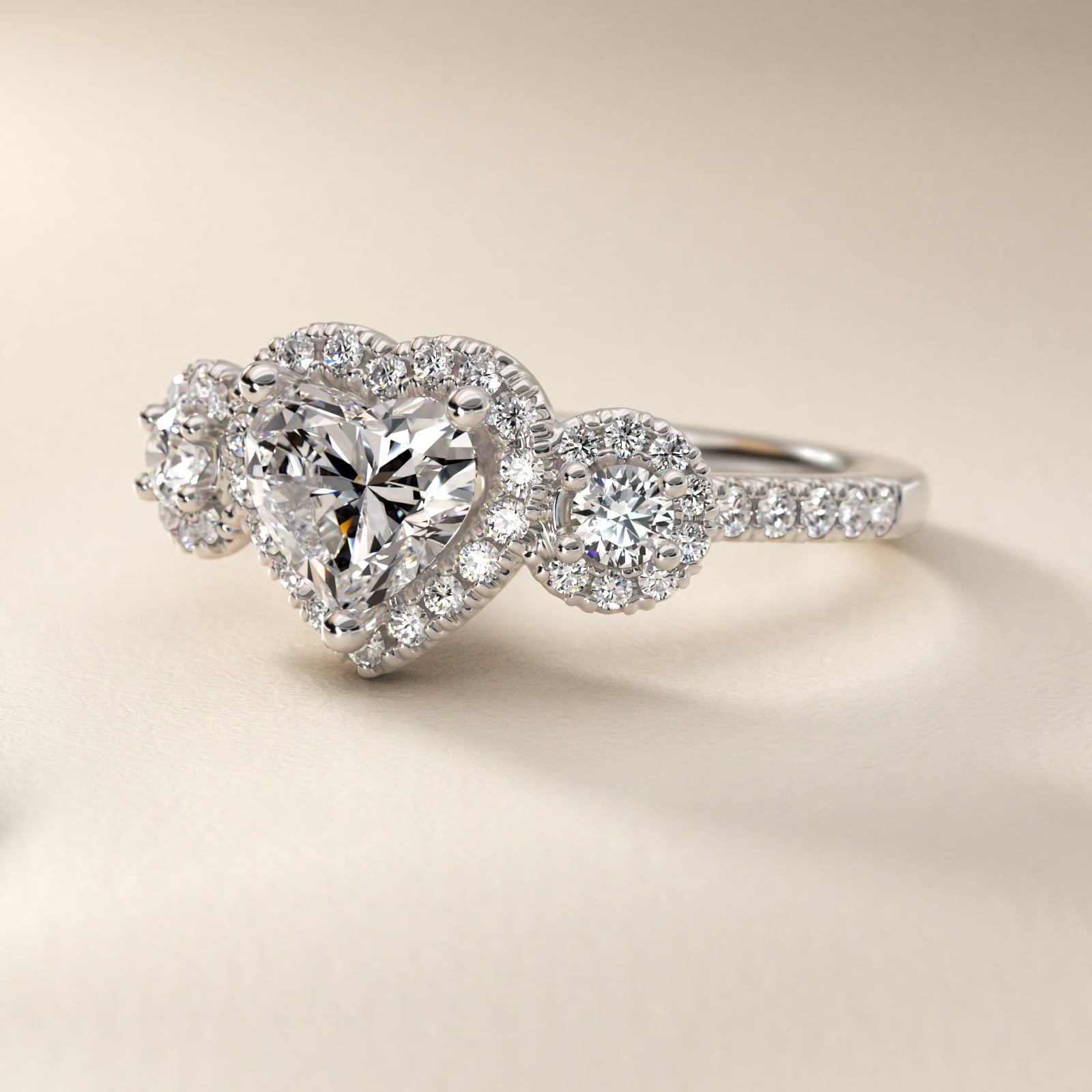 Three-Stone Halo Diamond Engagement Ring in Platinum - Heart Center