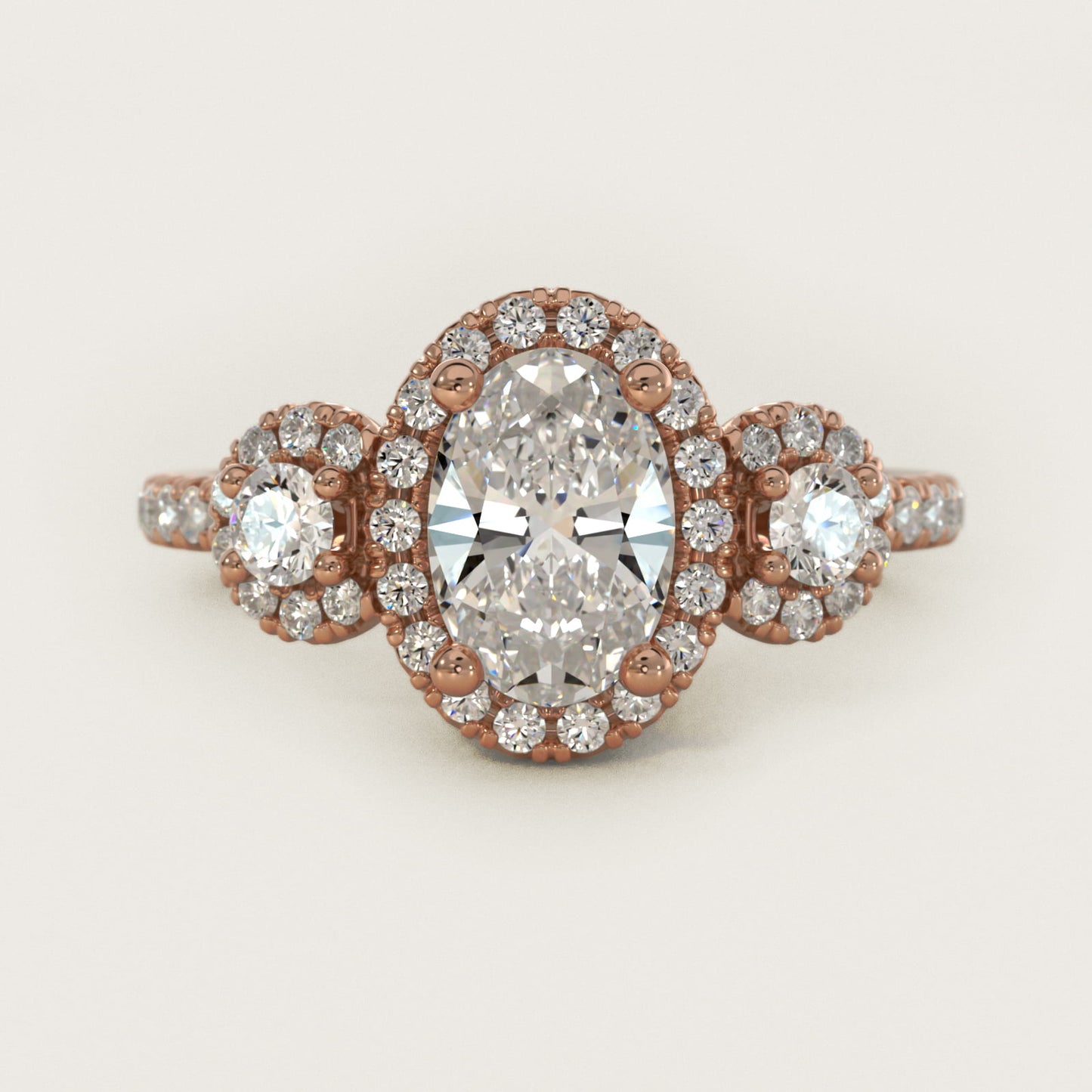 Three-Stone Halo Diamond Engagement Ring in 18k Rose Gold - Oval Center