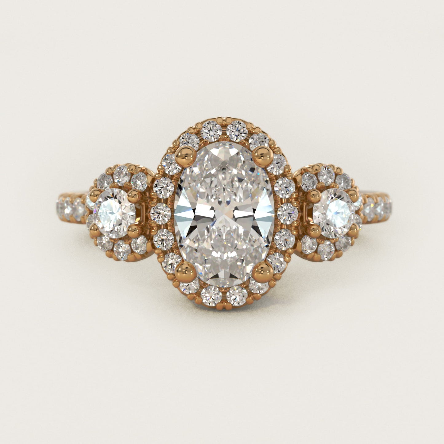Three-Stone Halo Diamond Engagement Ring in 18k Yellow Gold - Oval Center