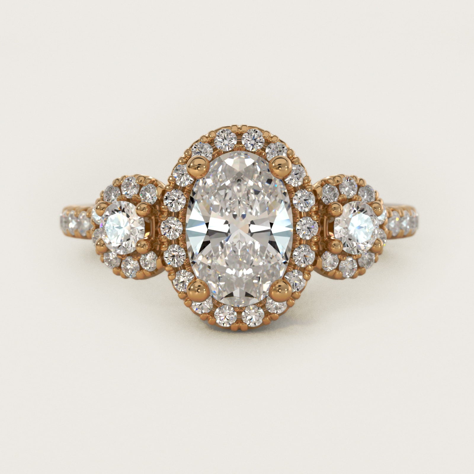 Three-Stone Halo Diamond Engagement Ring in 18k Yellow Gold - Oval Center
