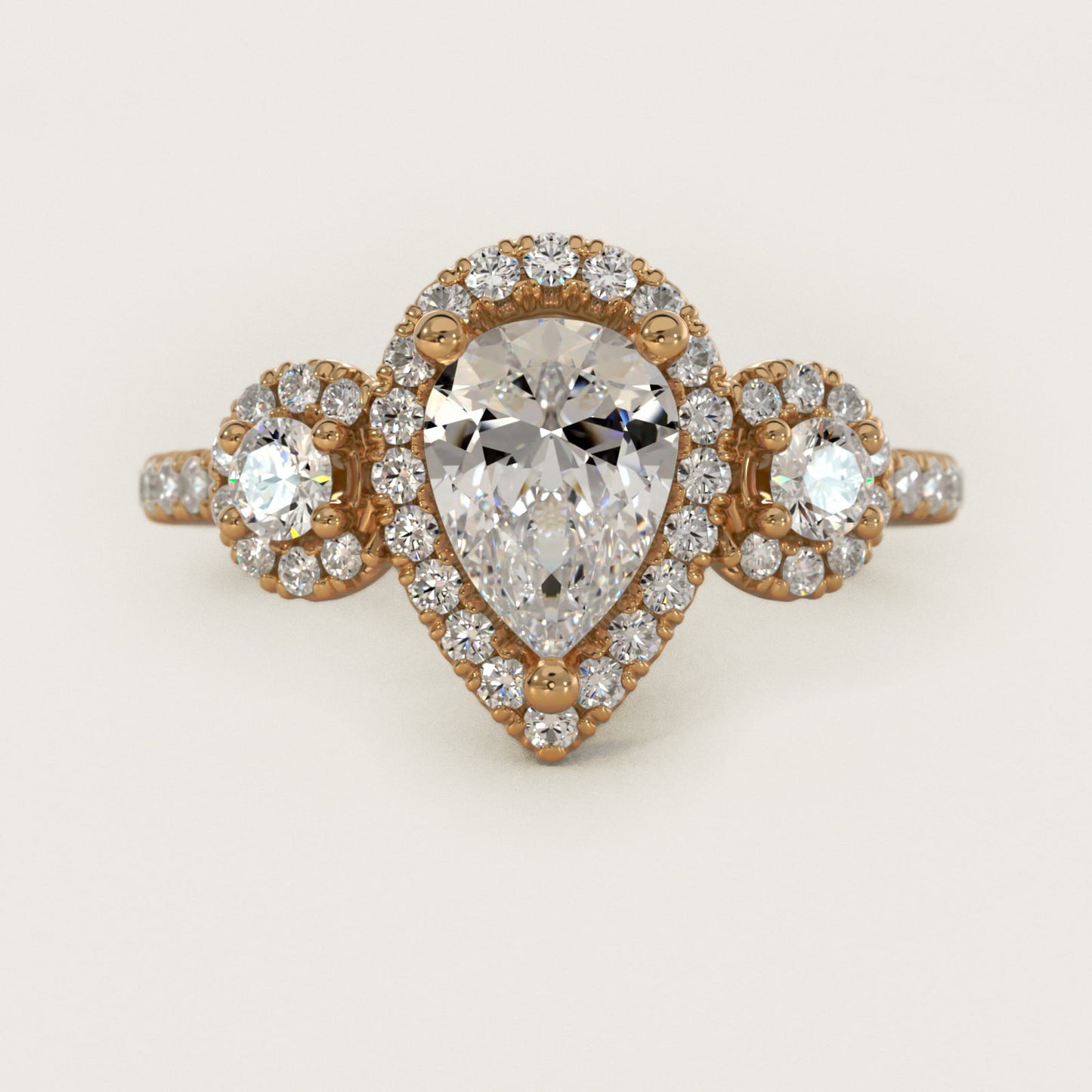 Three-Stone Halo Diamond Engagement Ring in 14k Yellow Gold - Pear Center