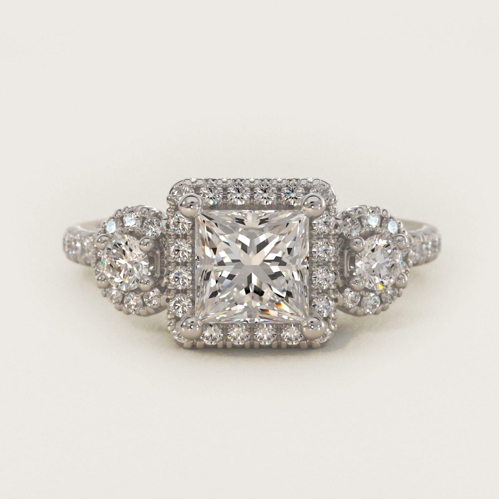 Three-Stone Halo Diamond Engagement Ring in 18k White Gold - Princess Center