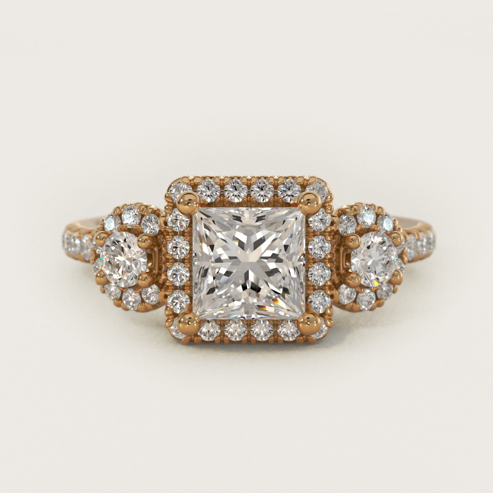 Three-Stone Halo Diamond Engagement Ring in 14k Yellow Gold - Princess Center