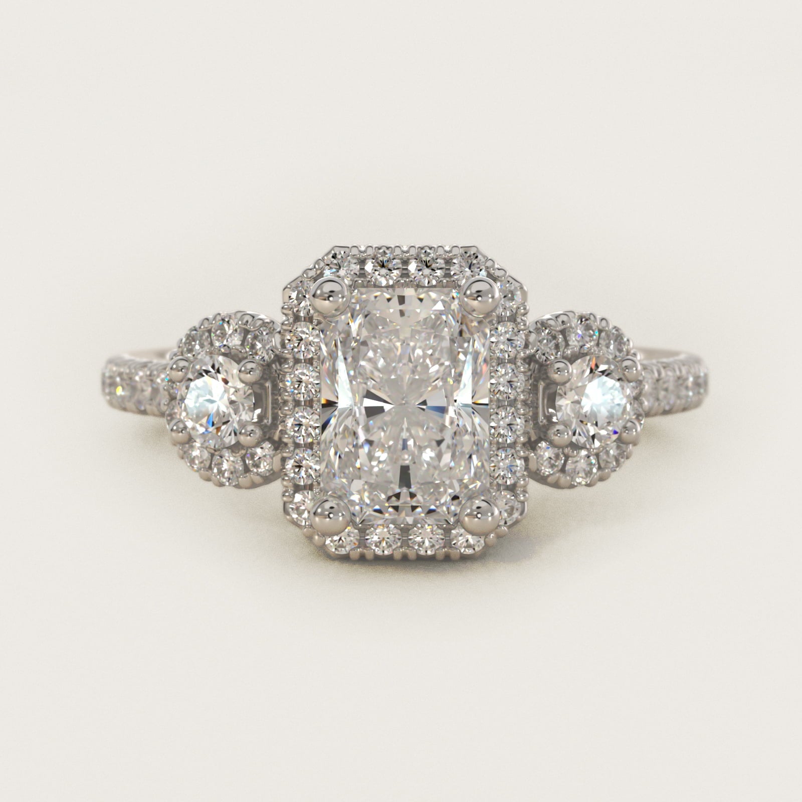 Three-Stone Halo Diamond Engagement Ring in 18k White Gold - Radiant Center