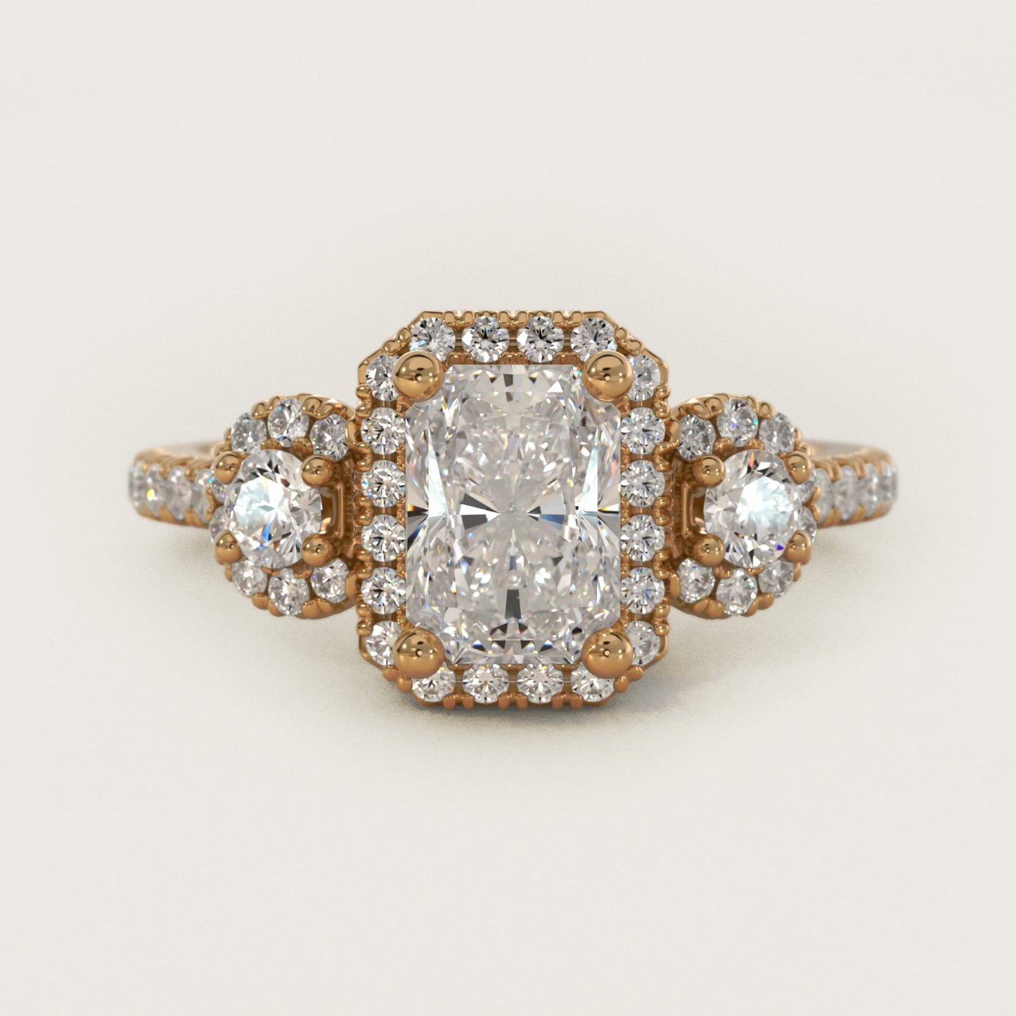 Three-Stone Halo Diamond Engagement Ring in 18k Yellow Gold - Radiant Center