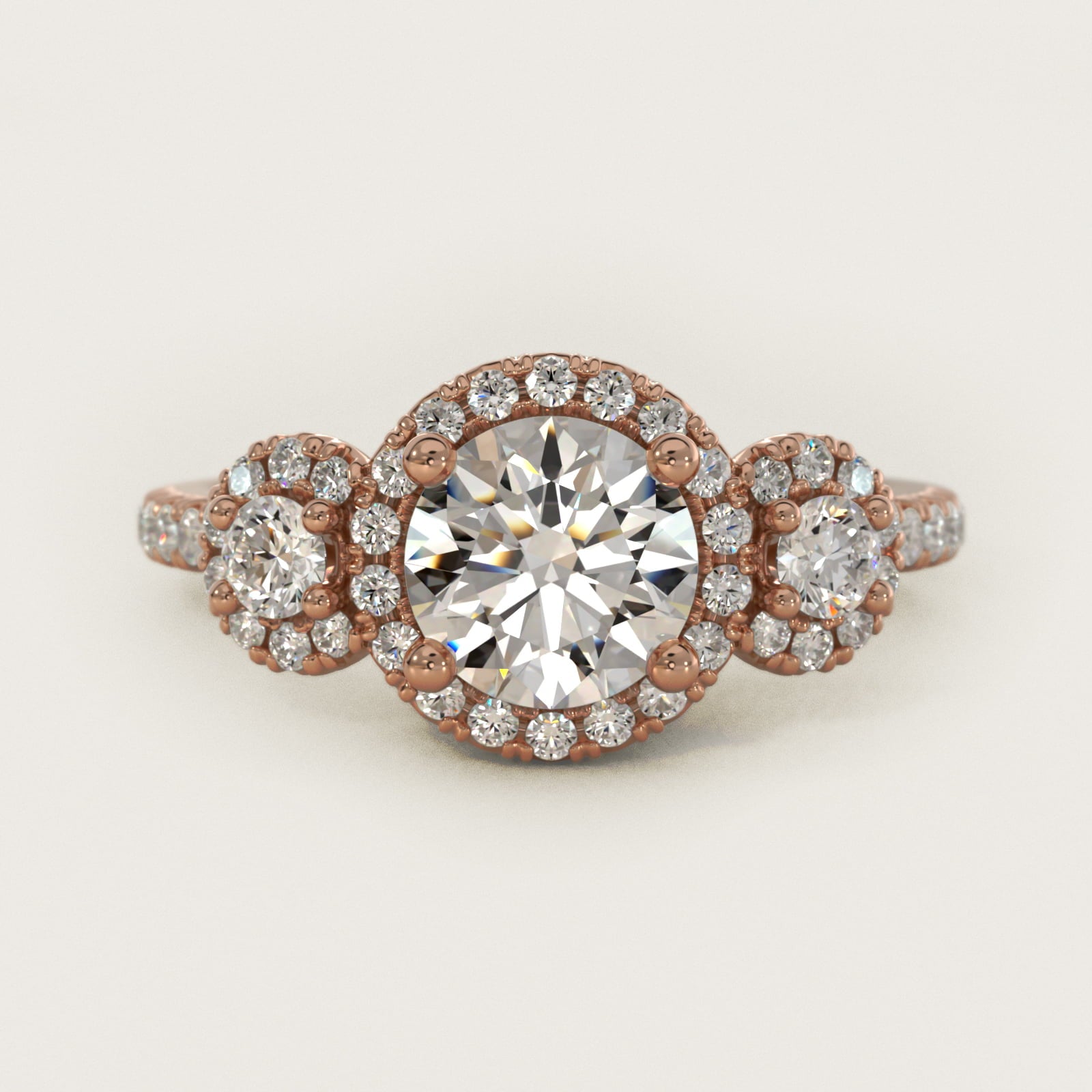 Three-Stone Halo Diamond Engagement Ring in 14k Rose Gold - Round Center
