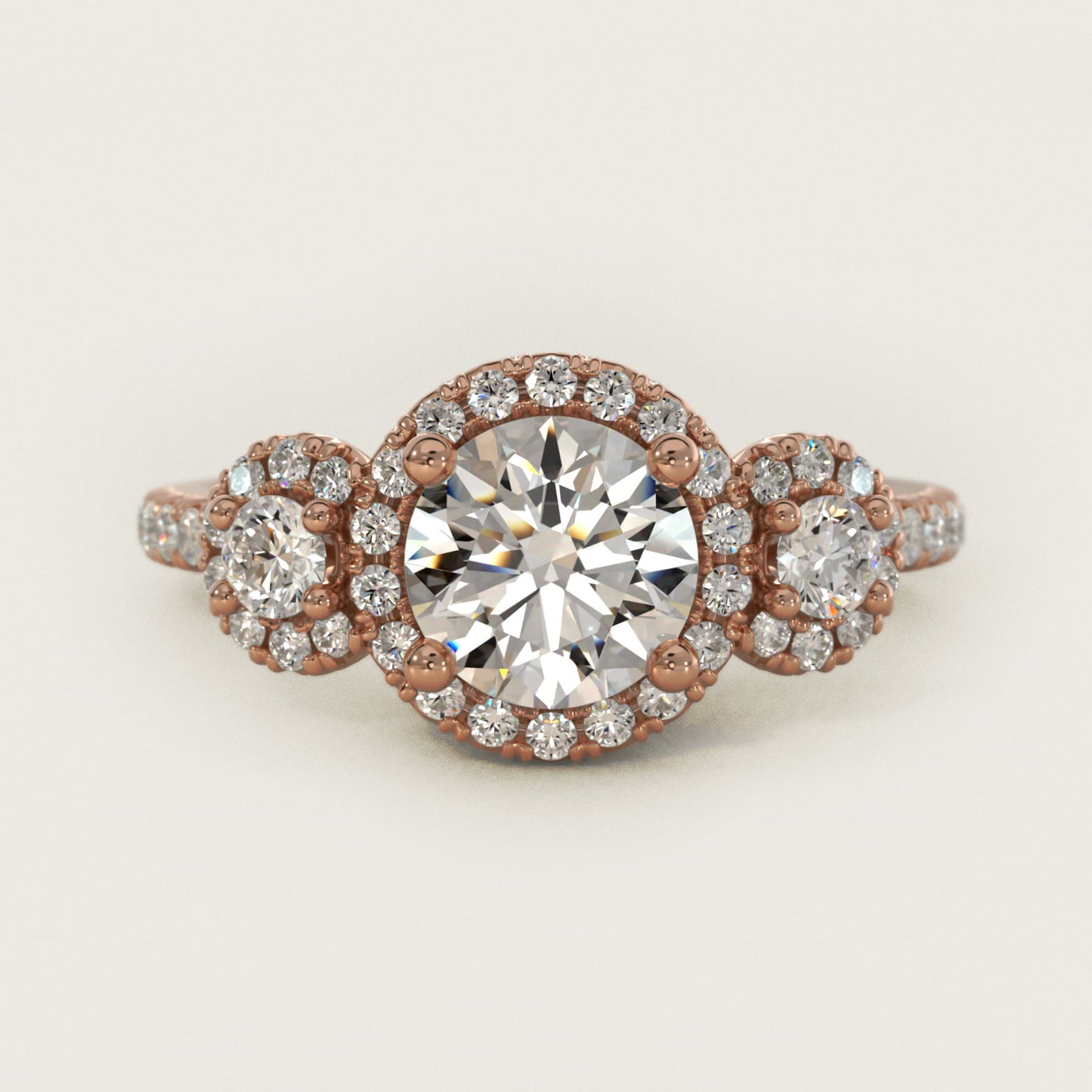 Three-Stone Halo Diamond Engagement Ring in 18k Rose Gold - Round Center