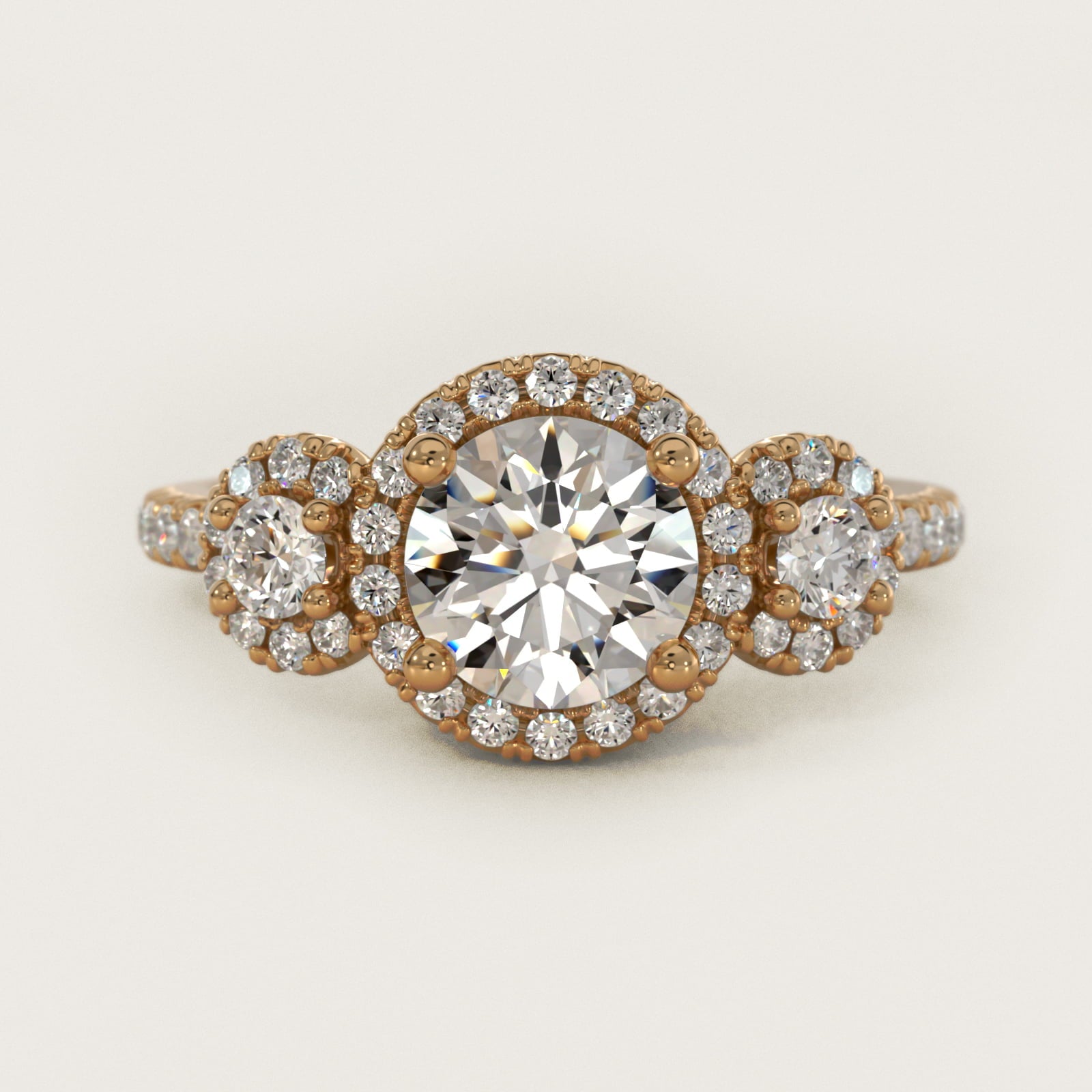 Three-Stone Halo Diamond Engagement Ring in 14k Yellow Gold - Round Center