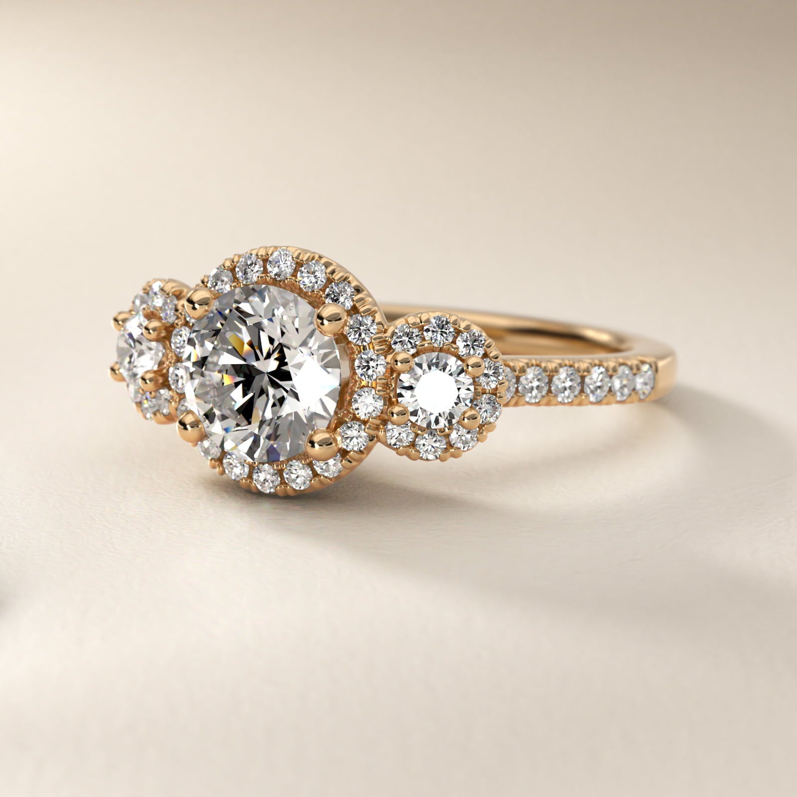 Three-Stone Halo Diamond Engagement Ring in 18k Yellow Gold - Round Center
