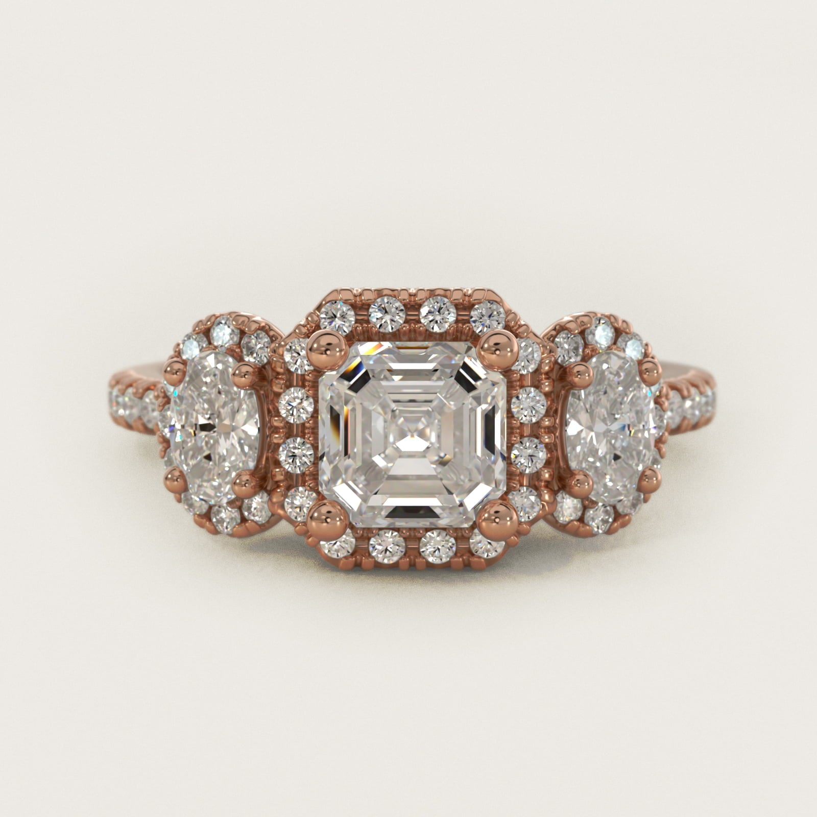 Three-Stone Oval Halo Diamond Engagement Ring in 14k Rose Gold - Asscher Center