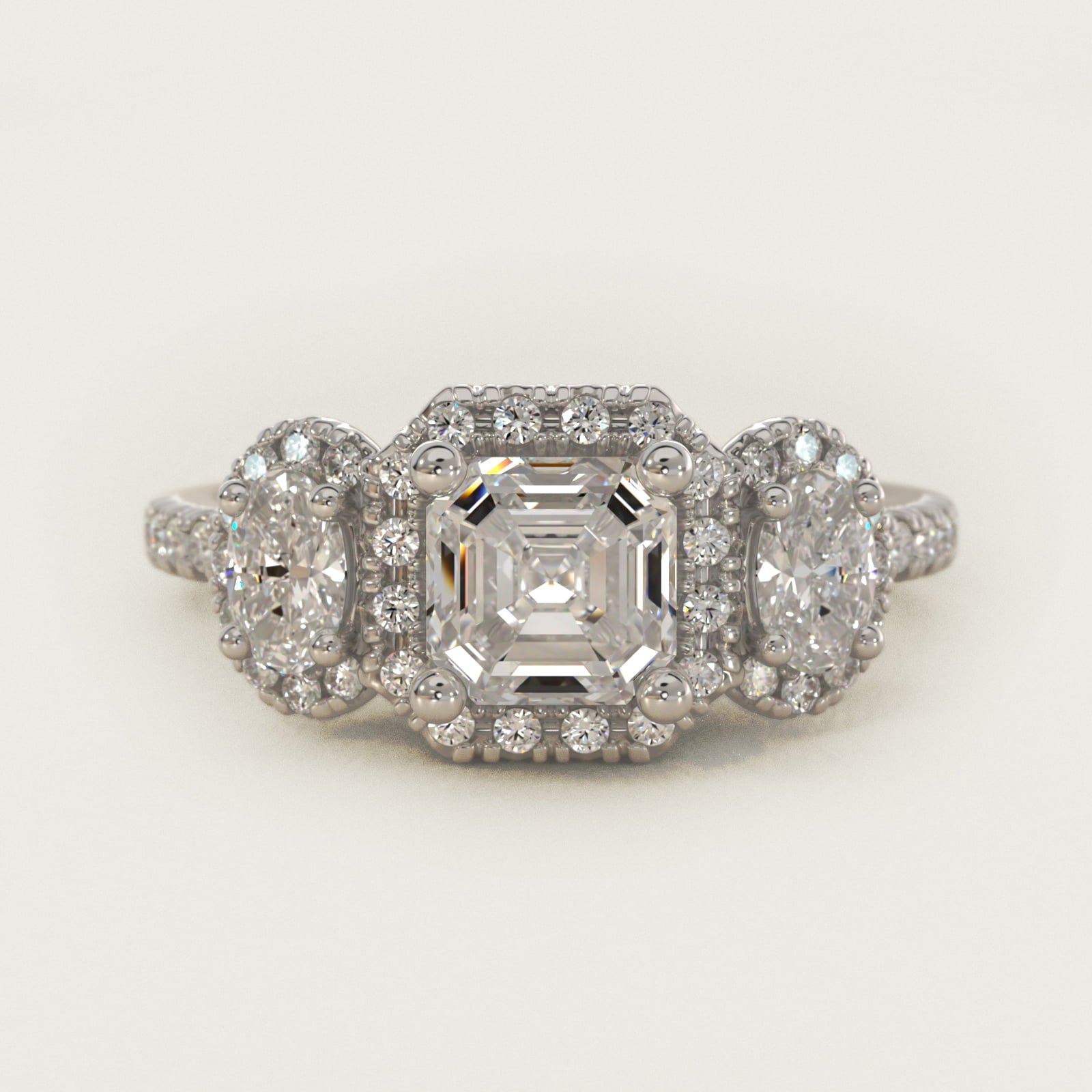 Three-Stone Oval Halo Diamond Engagement Ring in Platinum - Asscher Center