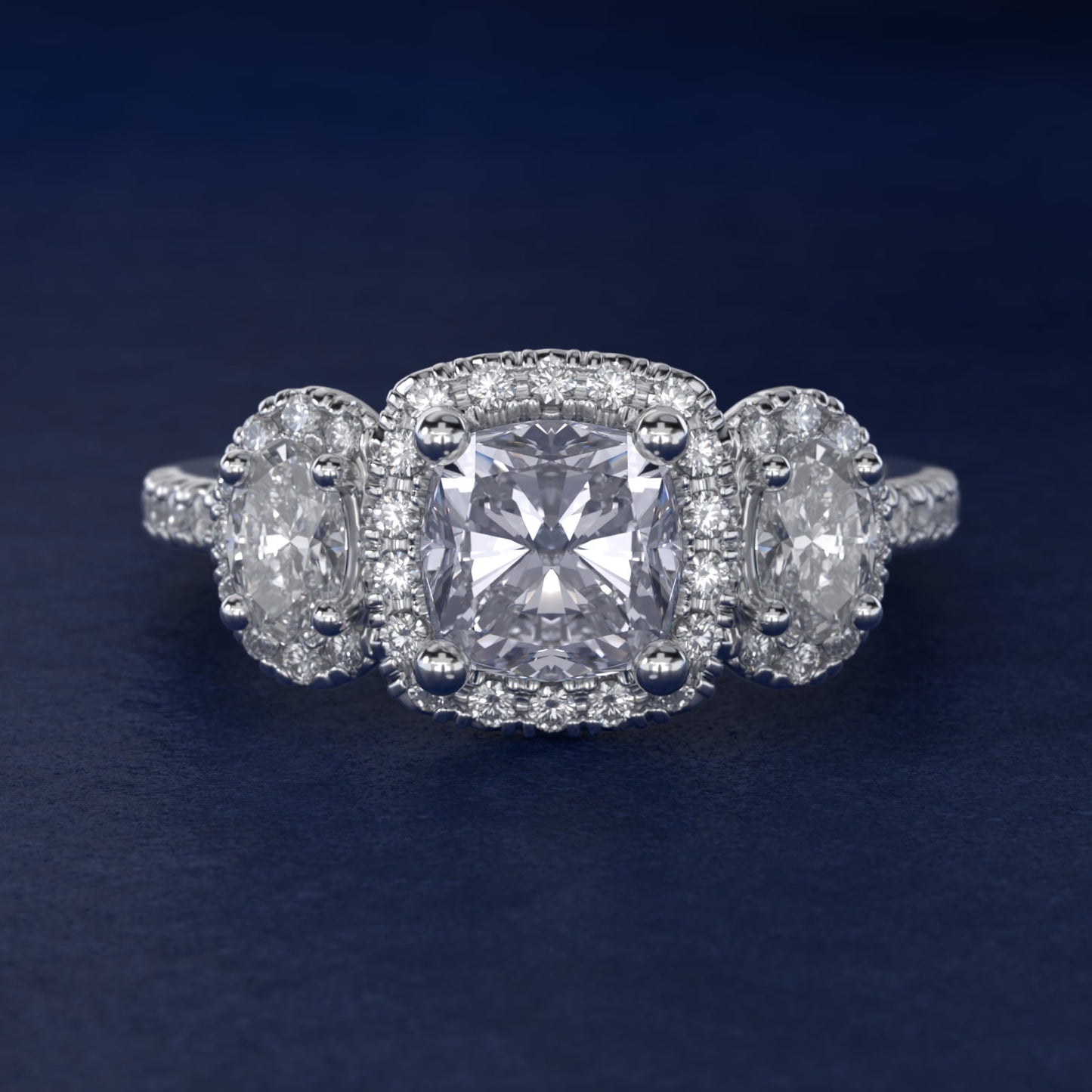 Three-Stone Oval Halo Diamond Engagement Ring in 18k White Gold - Cushion Center