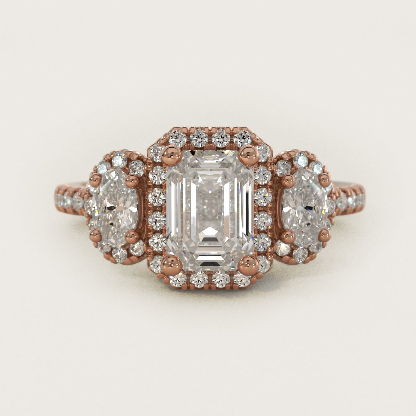 Three-Stone Oval Halo Diamond Engagement Ring in 14k Rose Gold - Emerald Center