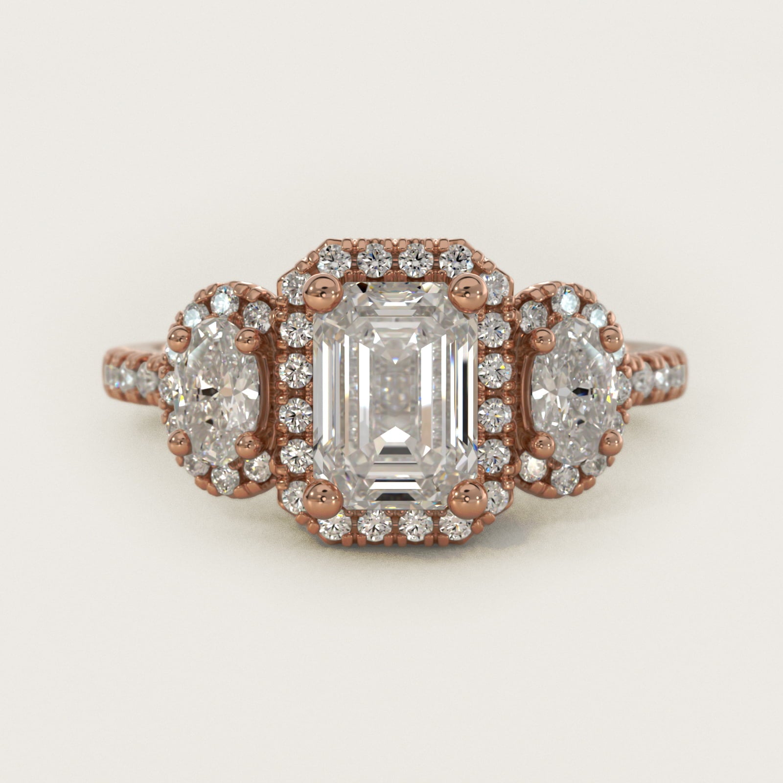 Three-Stone Oval Halo Diamond Engagement Ring in 14k Rose Gold - Emerald Center
