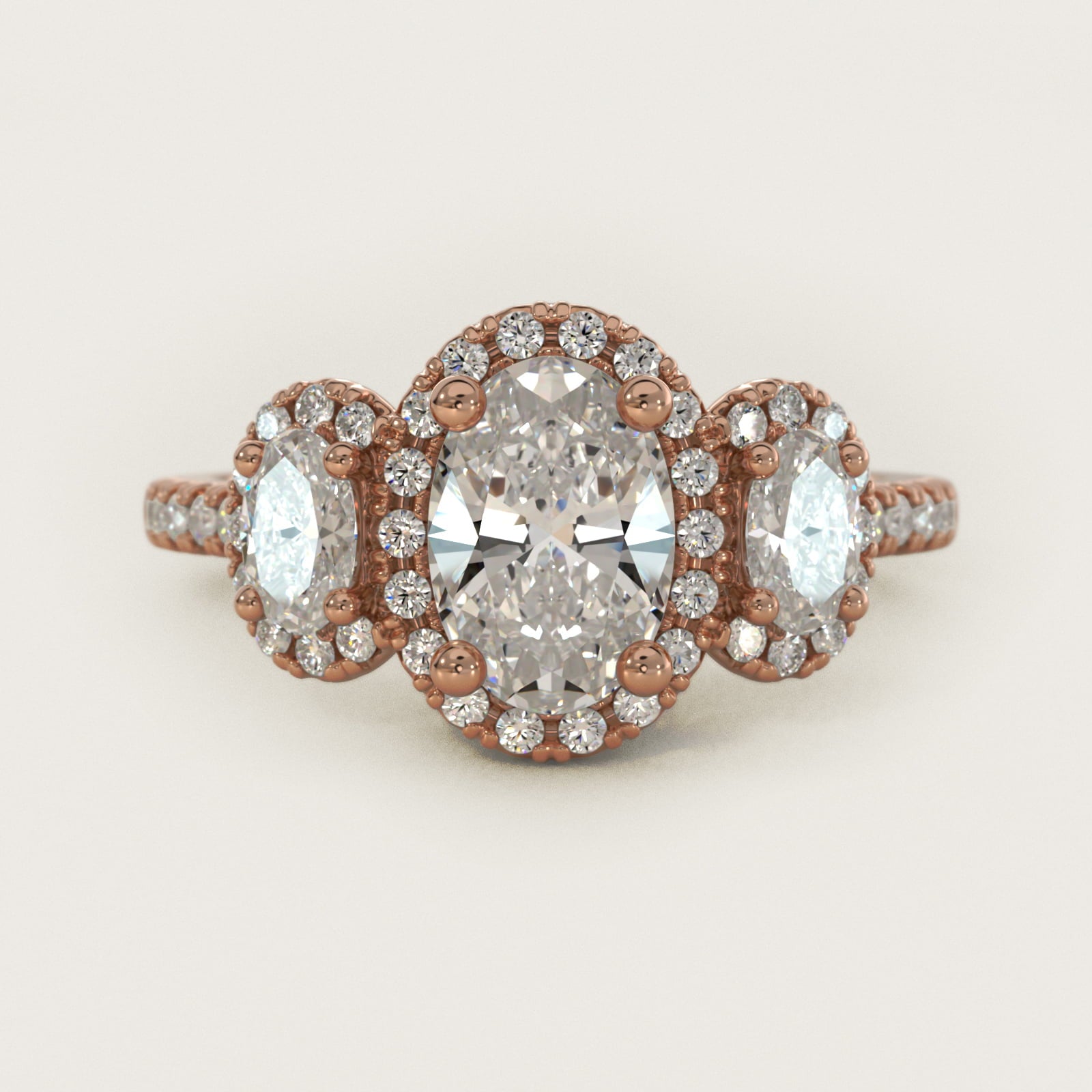 Three-Stone Oval Halo Diamond Engagement Ring in 14k Rose Gold - Oval Center