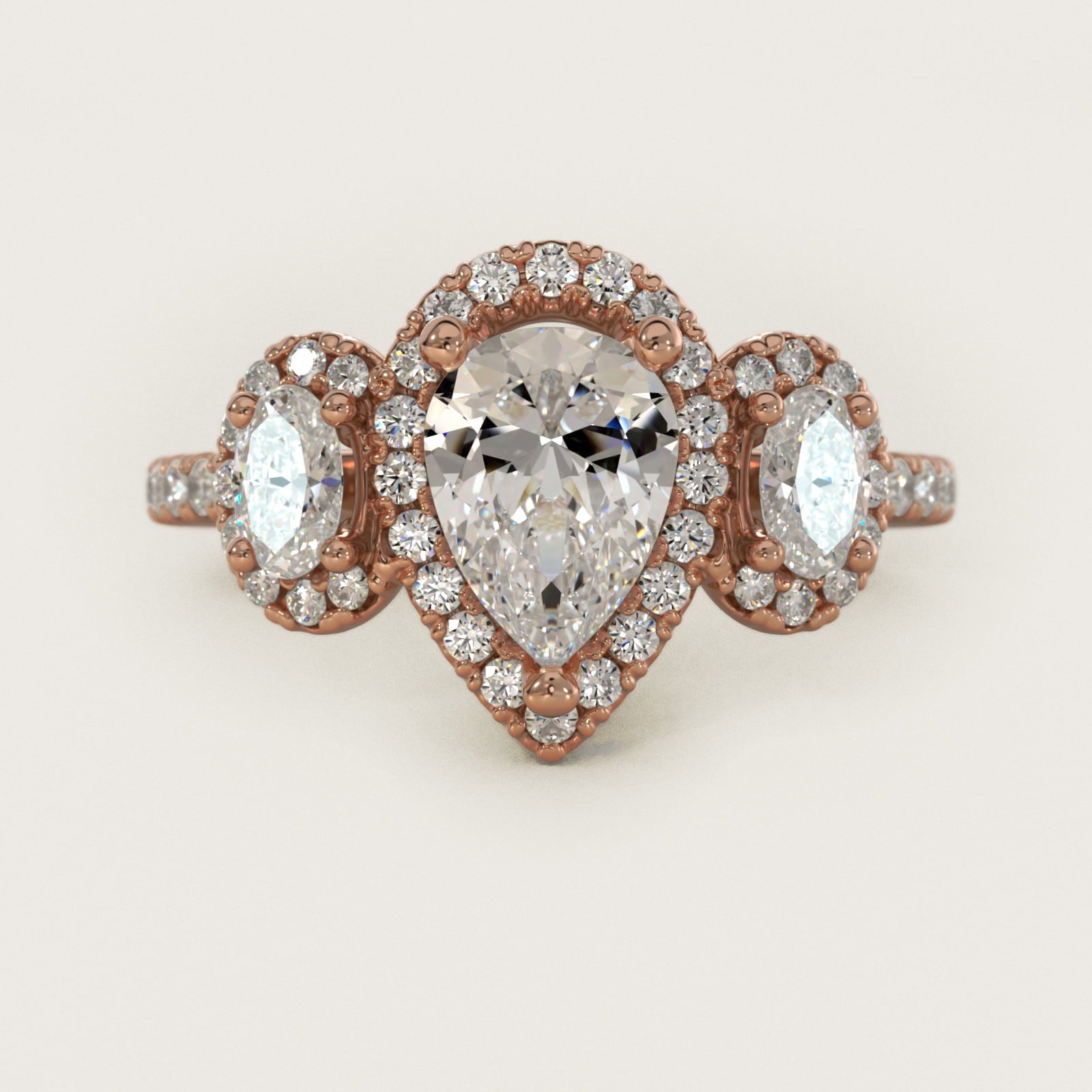 Three-Stone Oval Halo Diamond Engagement Ring in 18k Rose Gold - Pear Center