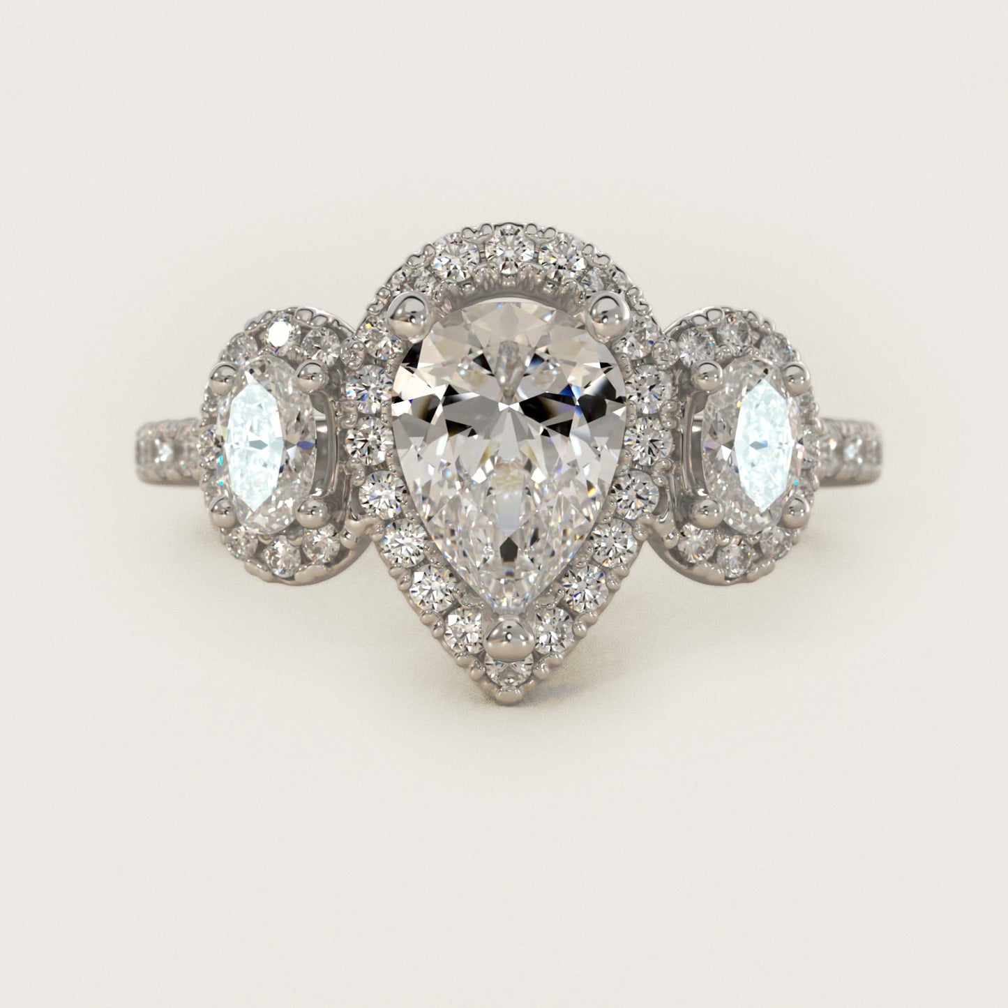 Three-Stone Oval Halo Diamond Engagement Ring in 18k White Gold - Pear Center