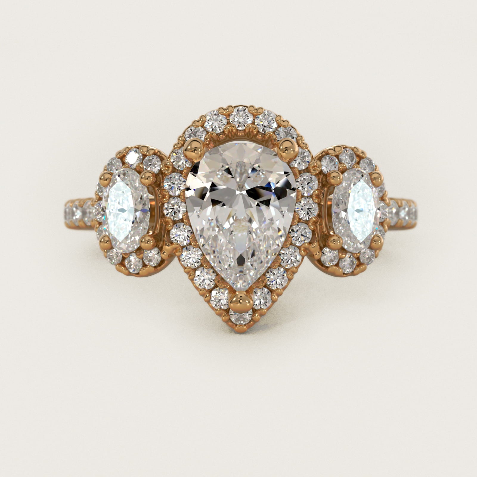 Three-Stone Oval Halo Diamond Engagement Ring in 14k Yellow Gold - Pear Center