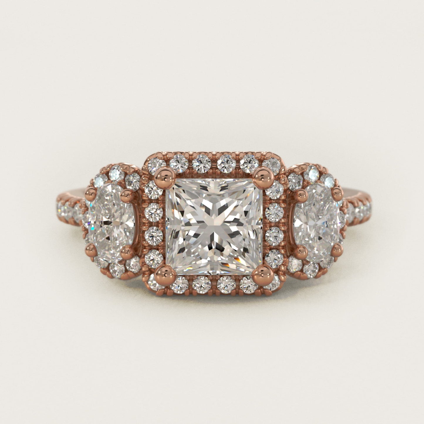 Three-Stone Oval Halo Diamond Engagement Ring in 18k Rose Gold - Princess Center