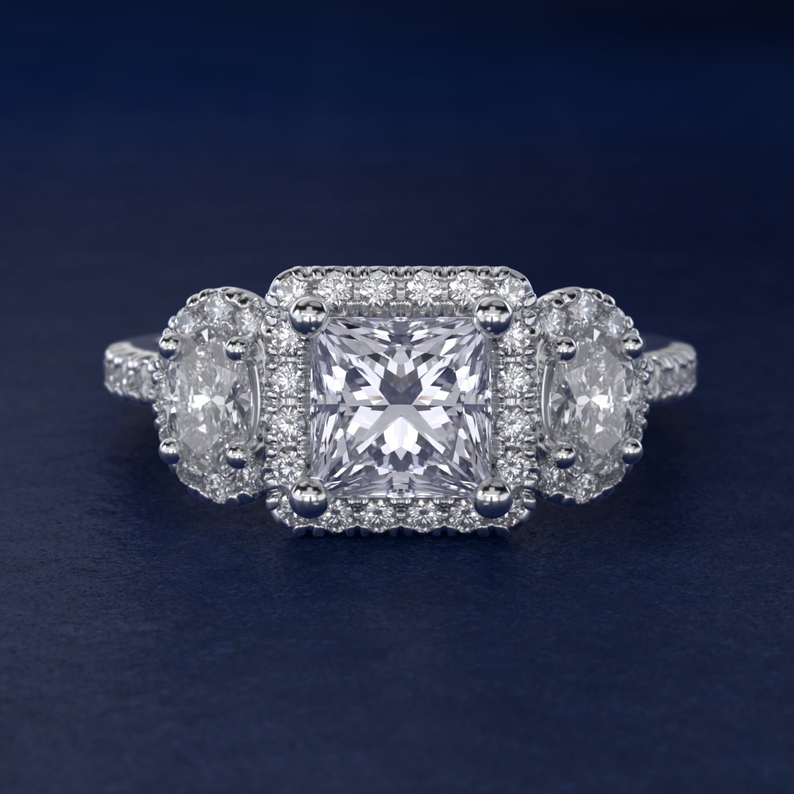 Three-Stone Oval Halo Diamond Engagement Ring in 18k White Gold - Princess Center
