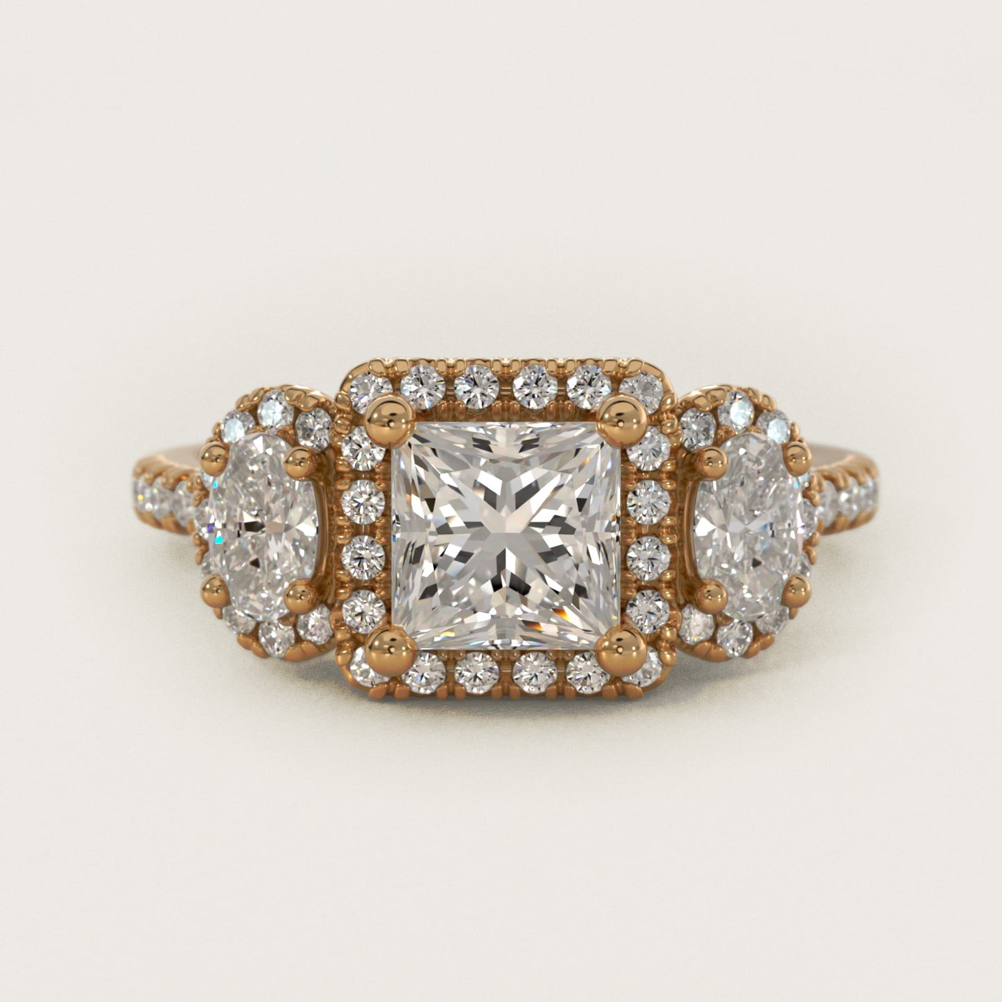 Three-Stone Oval Halo Diamond Engagement Ring in 14k Yellow Gold - Princess Center