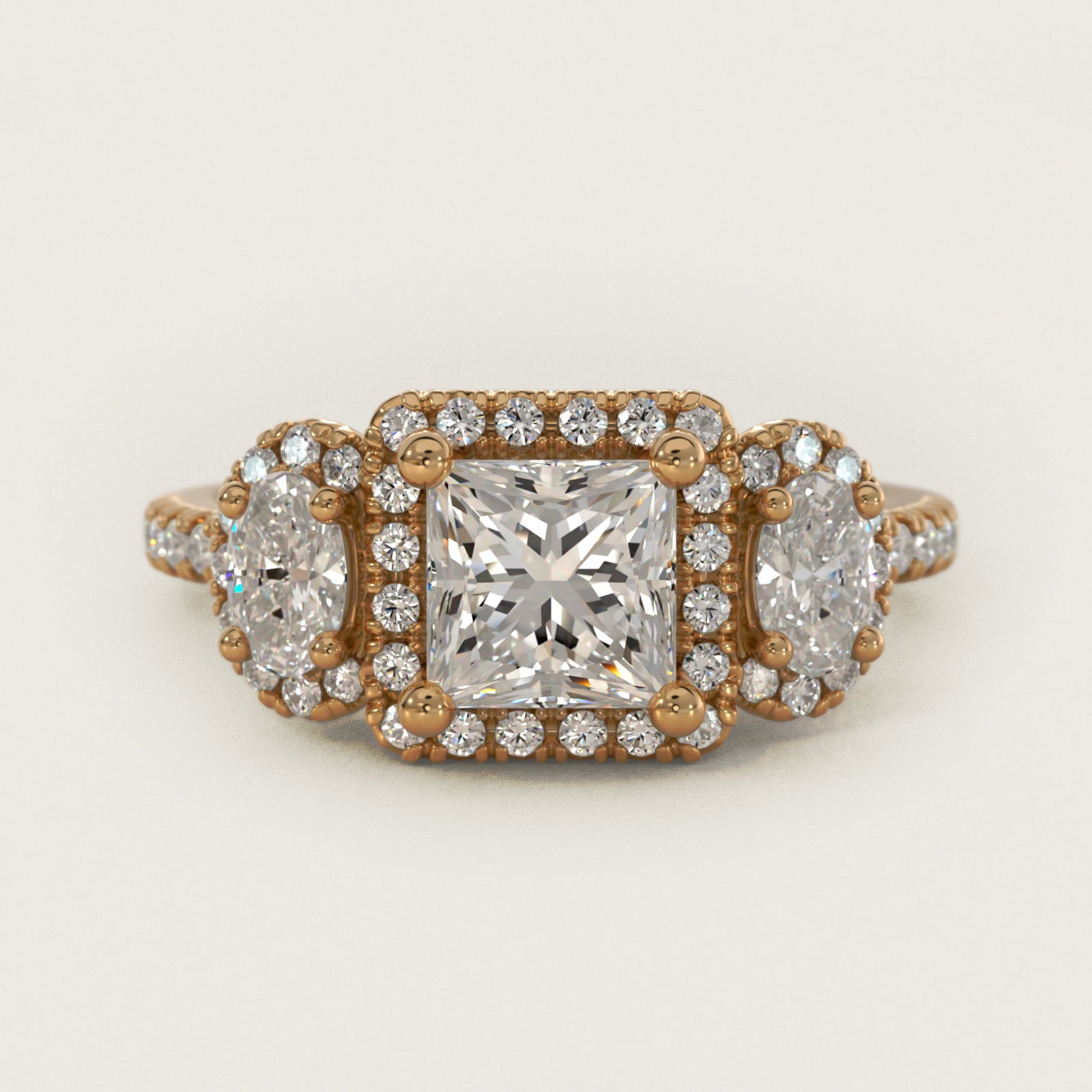 Three-Stone Oval Halo Diamond Engagement Ring in 14k Yellow Gold - Princess Center