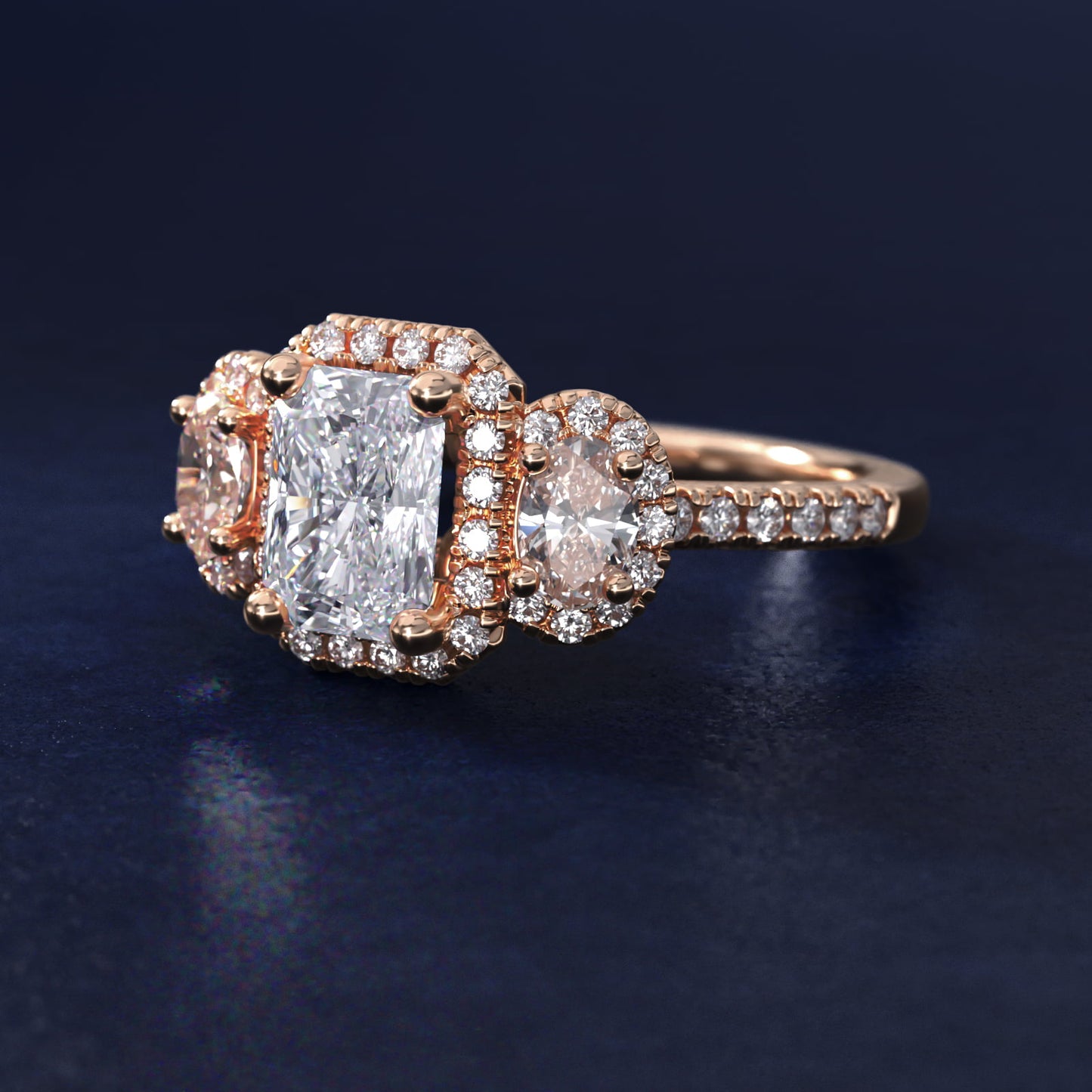 Three-Stone Oval Halo Diamond Engagement Ring in 18k Rose Gold - Radiant Center