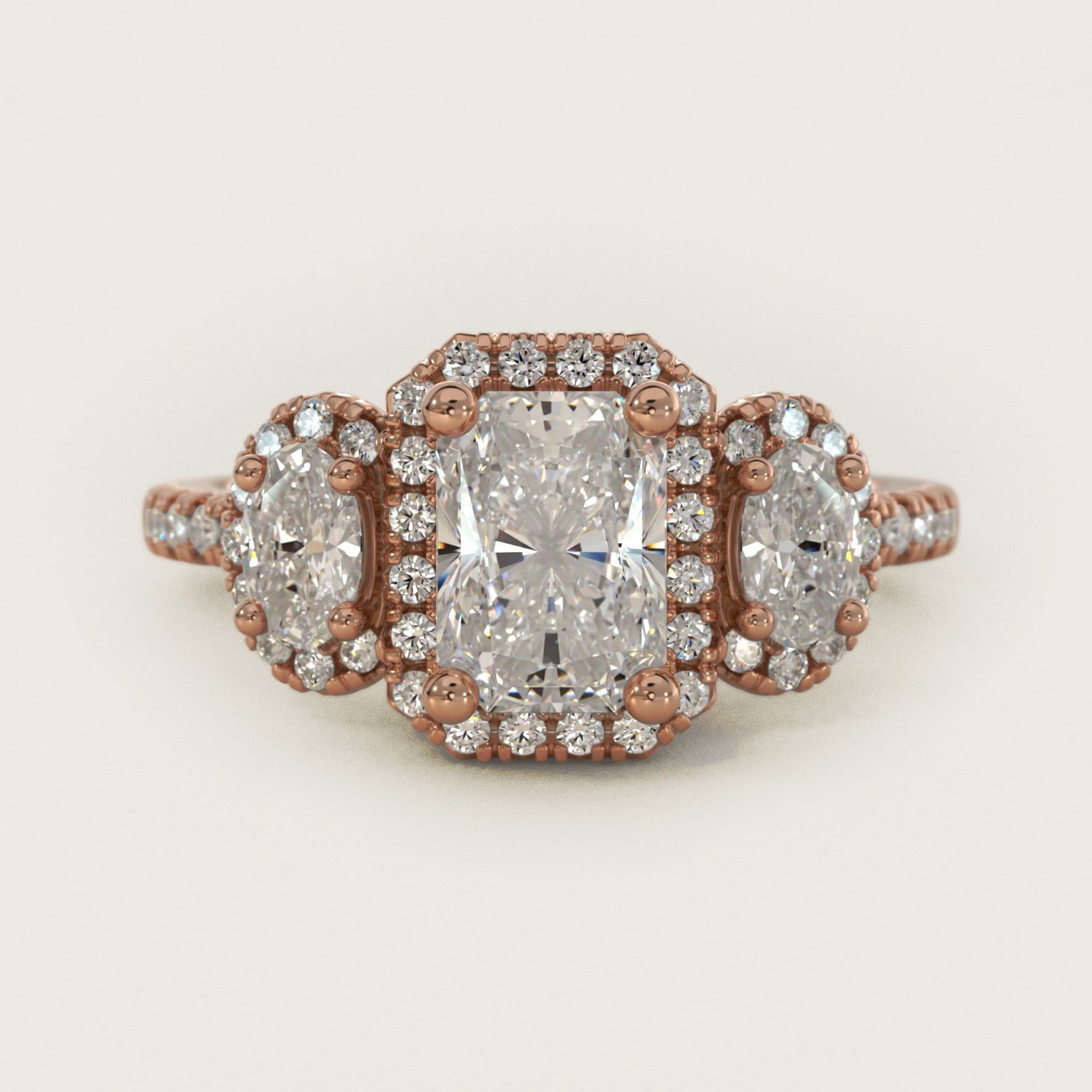 Three-Stone Oval Halo Diamond Engagement Ring in 14k Rose Gold - Radiant Center