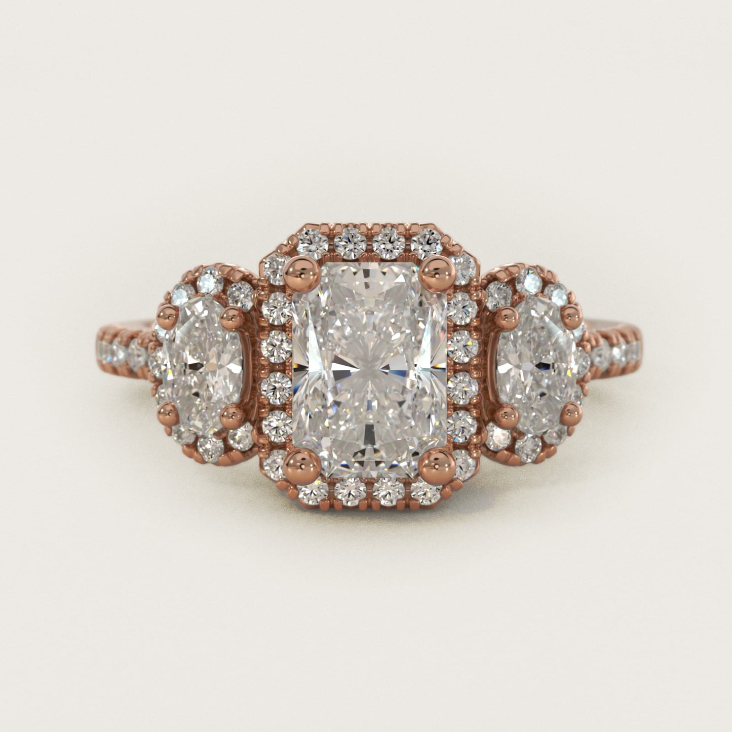 Three-Stone Oval Halo Diamond Engagement Ring in 18k Rose Gold - Radiant Center