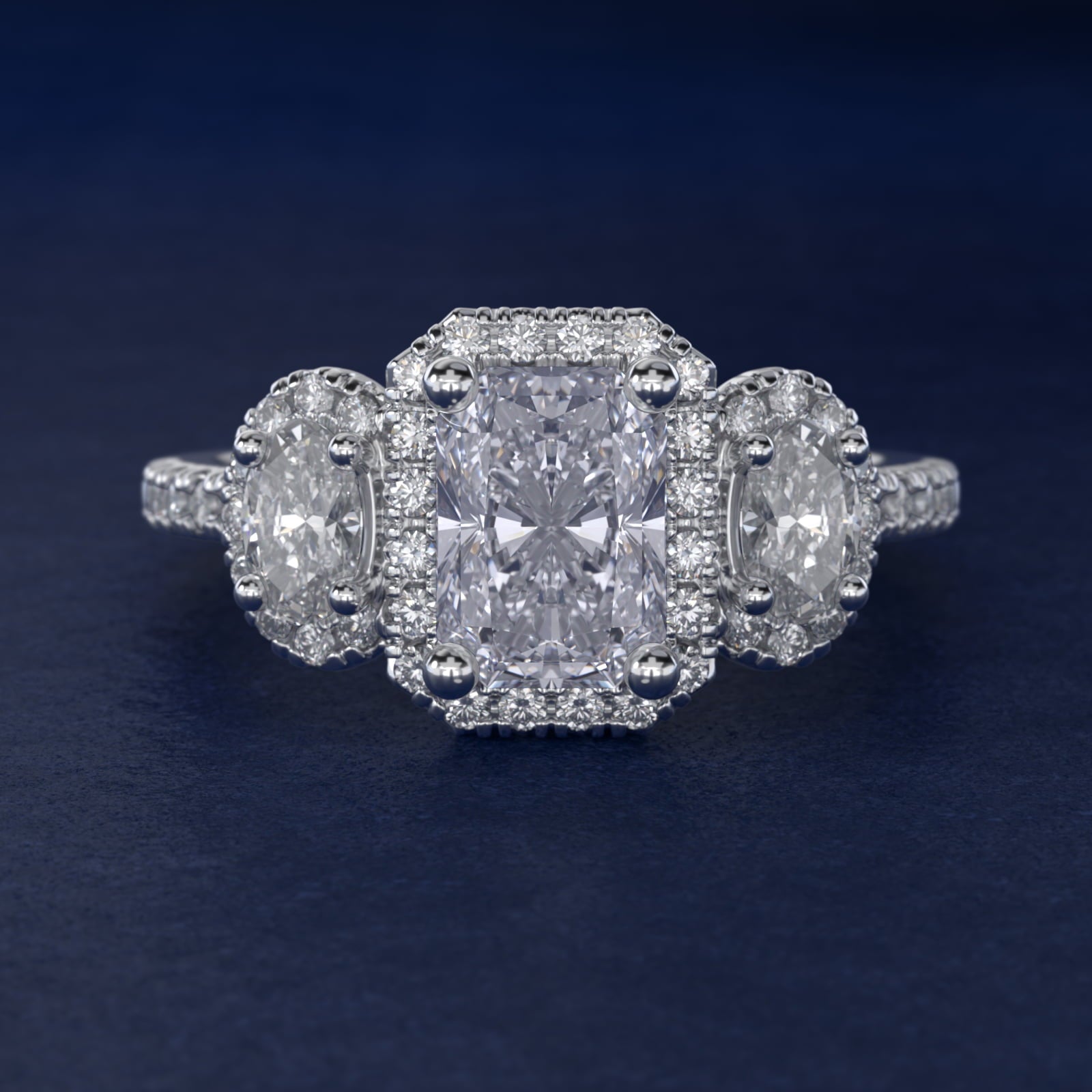 Three-Stone Oval Halo Diamond Engagement Ring in 18k White Gold - Radiant Center