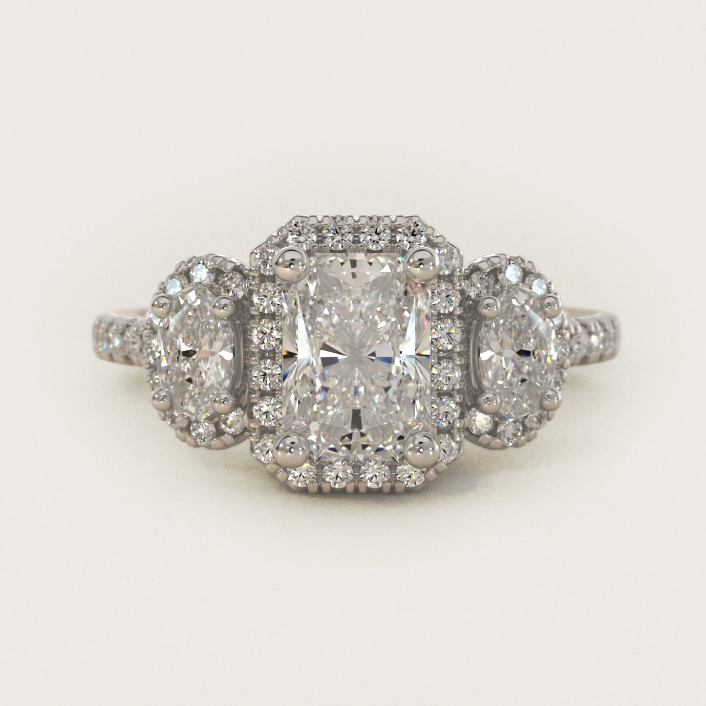 Three-Stone Oval Halo Diamond Engagement Ring in 14k White Gold - Radiant Center