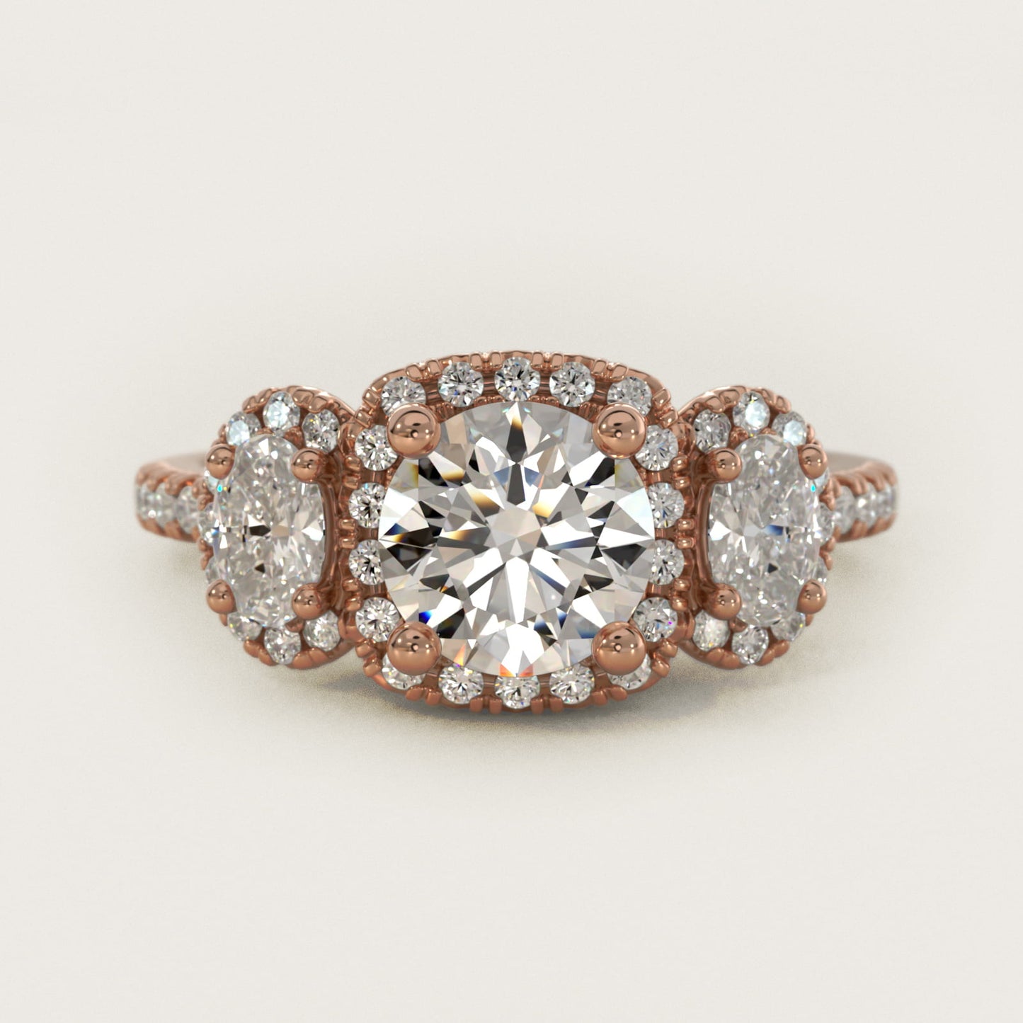 Three-Stone Oval Halo Diamond Engagement Ring in 18k Rose Gold - Round Center