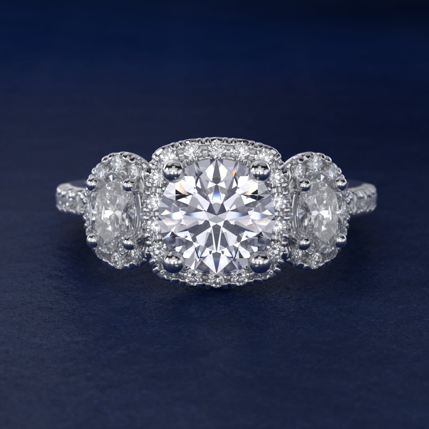 Three-Stone Oval Halo Diamond Engagement Ring in 14k White Gold - Round Center