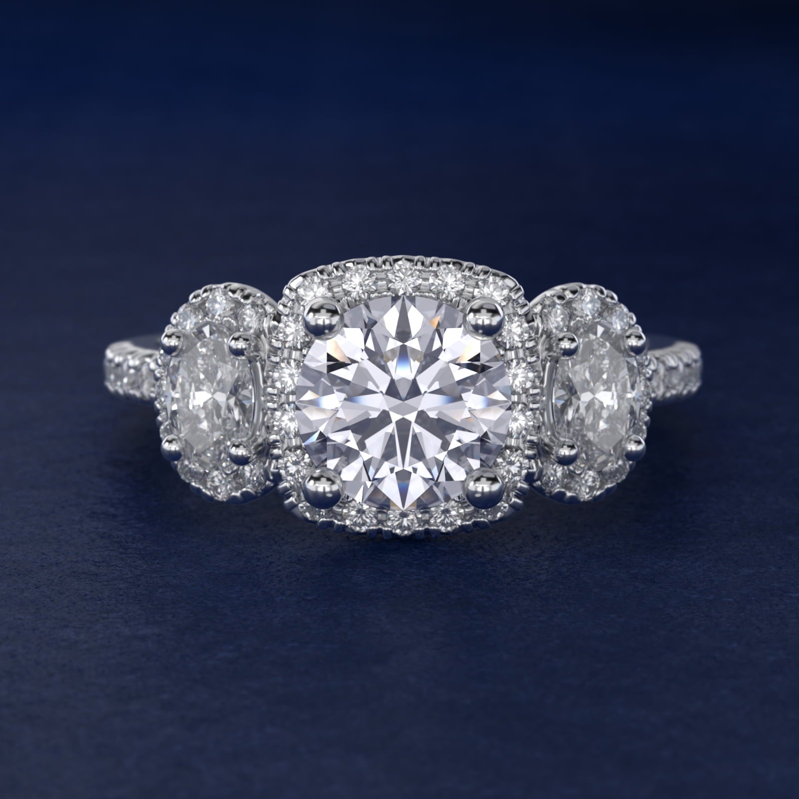 Three-Stone Oval Halo Diamond Engagement Ring in 14k White Gold - Round Center