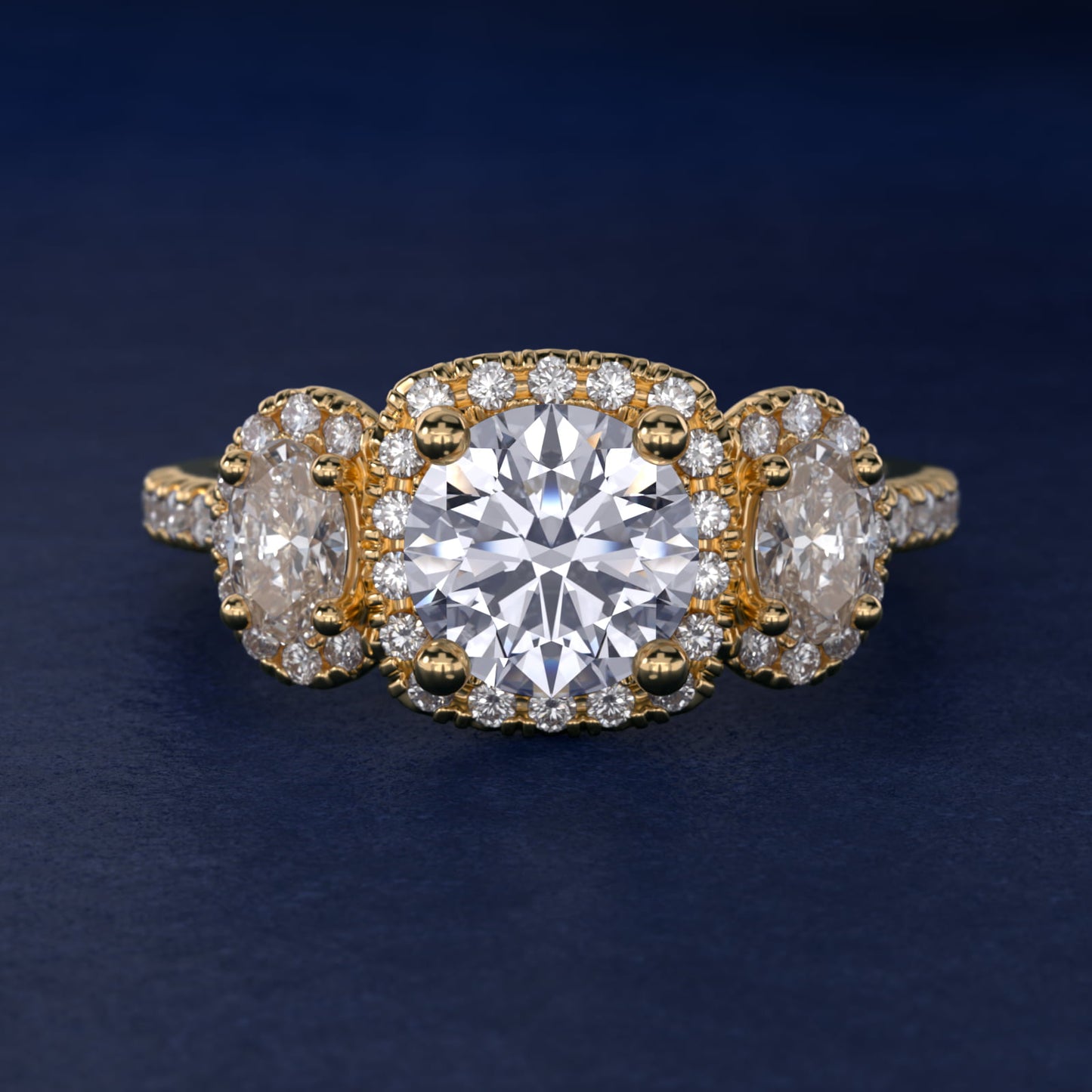 Three-Stone Oval Halo Diamond Engagement Ring in 18k Yellow Gold - Round Center