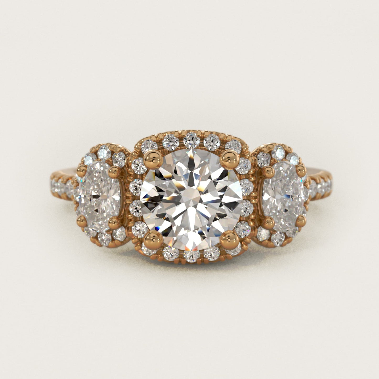 Three-Stone Oval Halo Diamond Engagement Ring in 14k Yellow Gold - Round Center