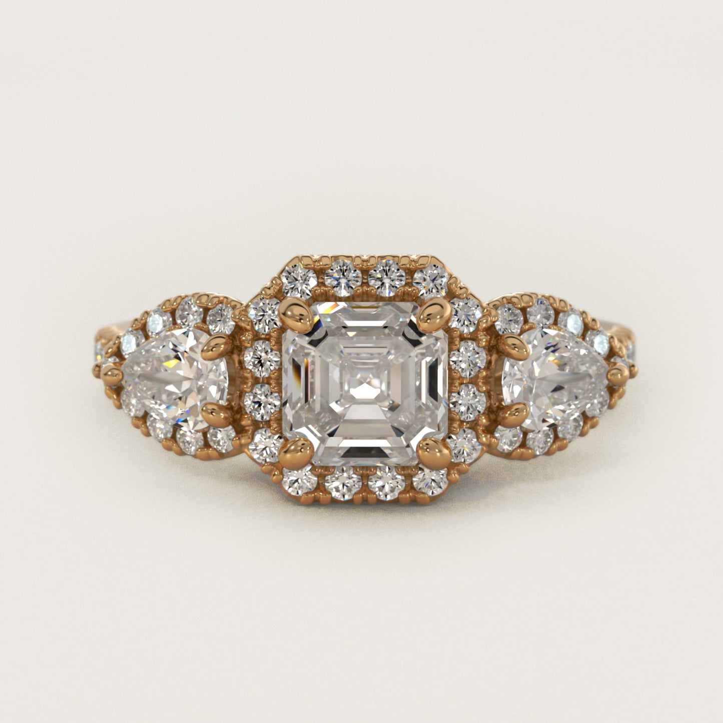 Three-Stone Pear Halo Diamond Engagement Ring in 14k Yellow Gold - Asscher Center