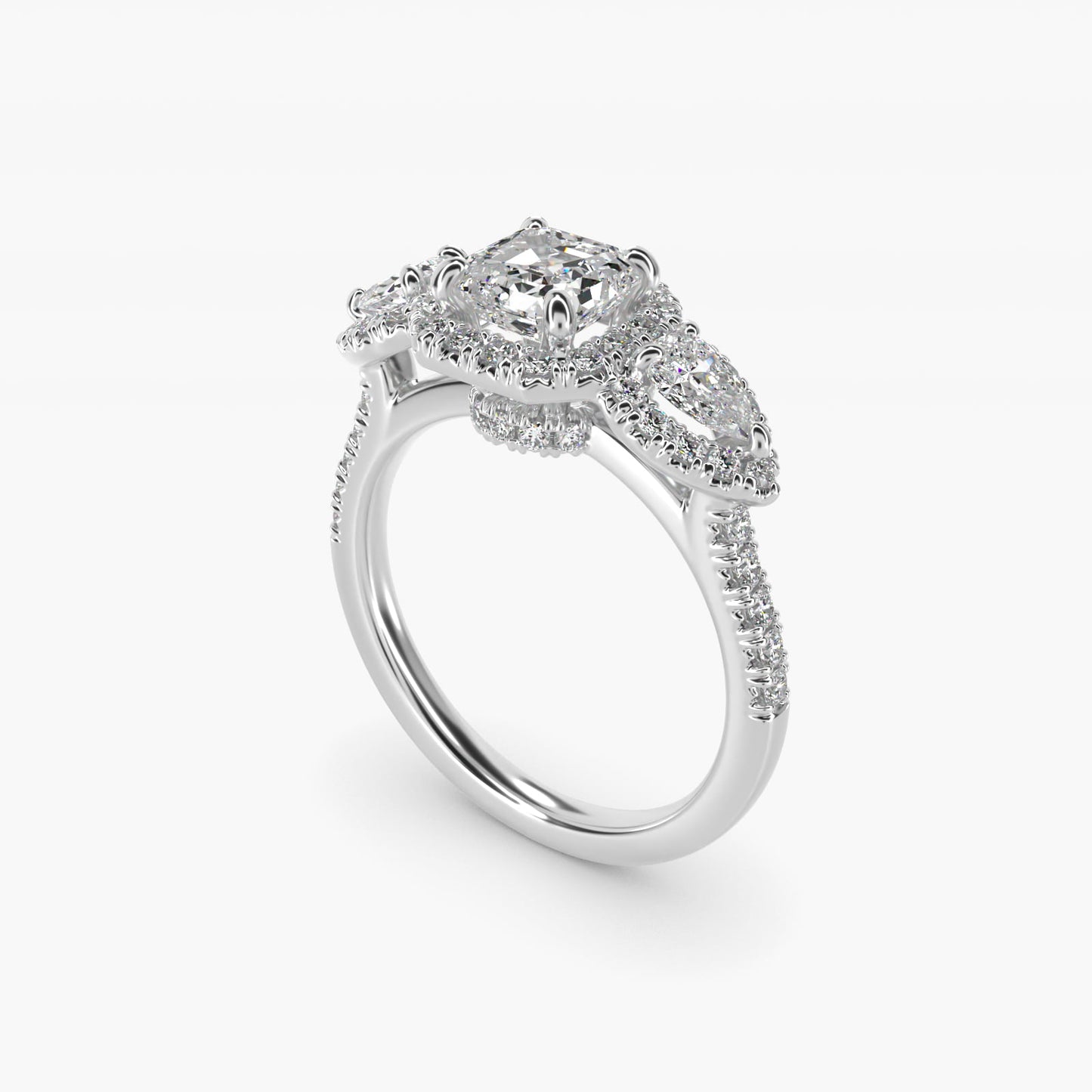 Three-Stone Pear Halo Diamond Engagement Ring in Platinum - Asscher Center