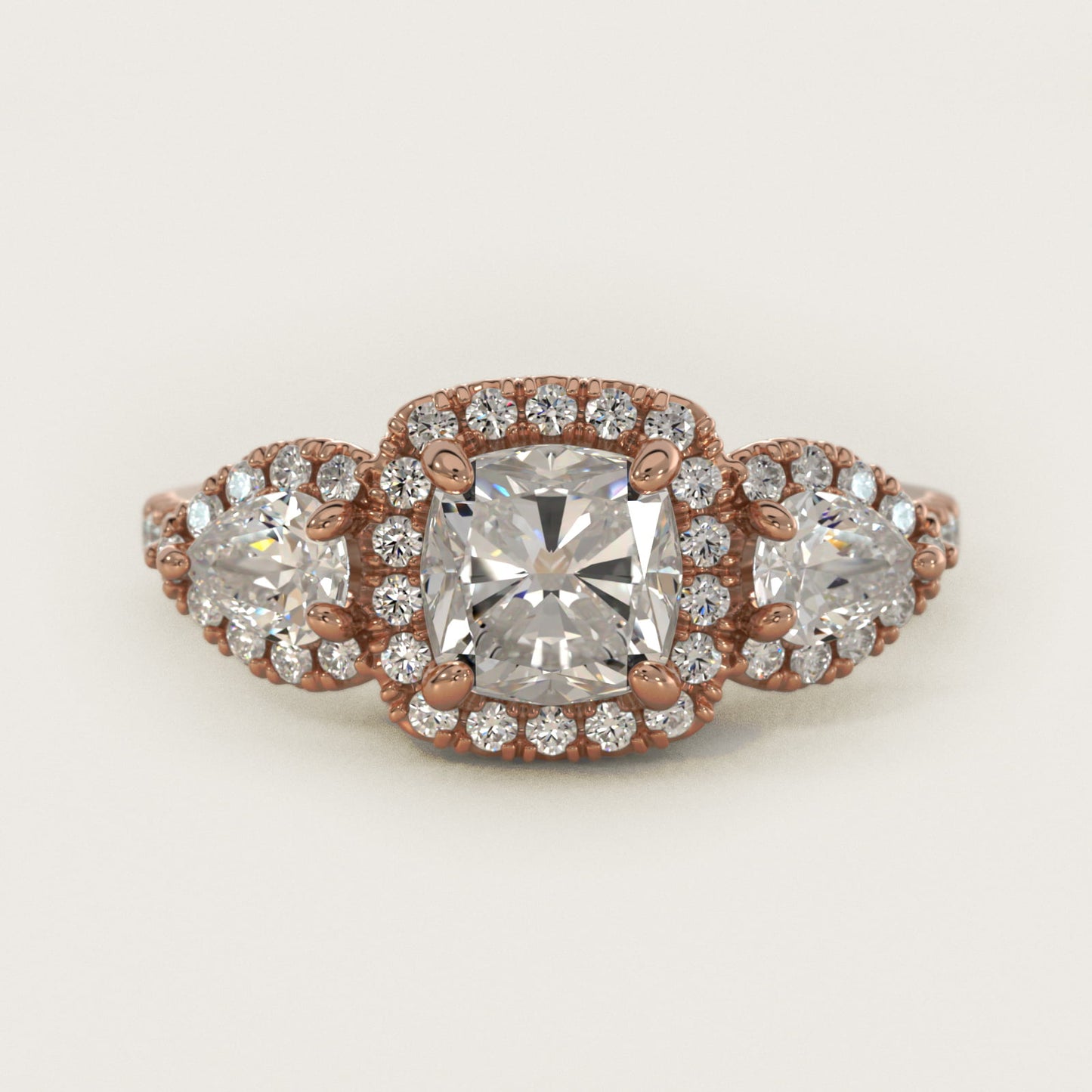 Three-Stone Pear Halo Diamond Engagement Ring in 18k Rose Gold - Cushion Center