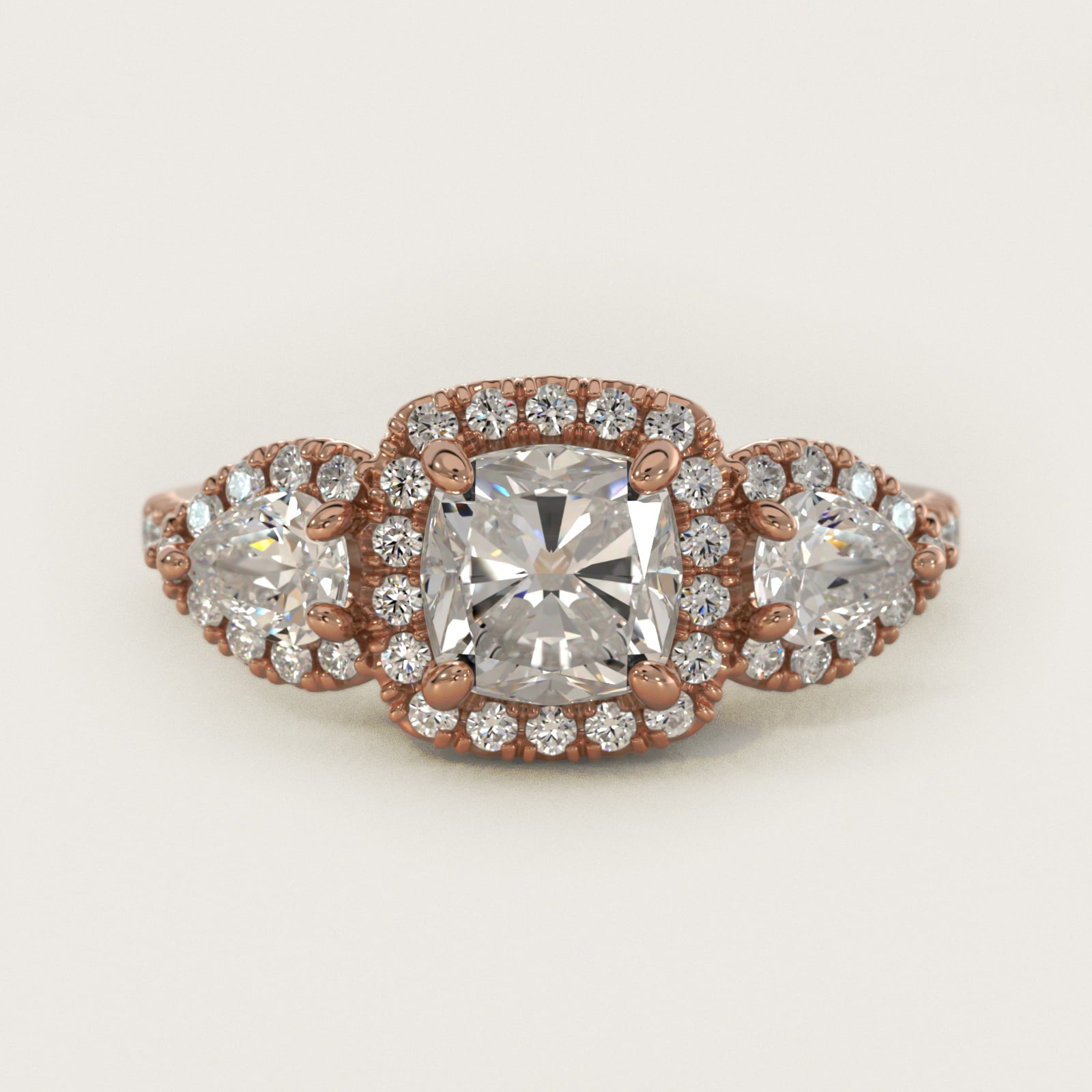 Three-Stone Pear Halo Diamond Engagement Ring in 18k Rose Gold - Cushion Center