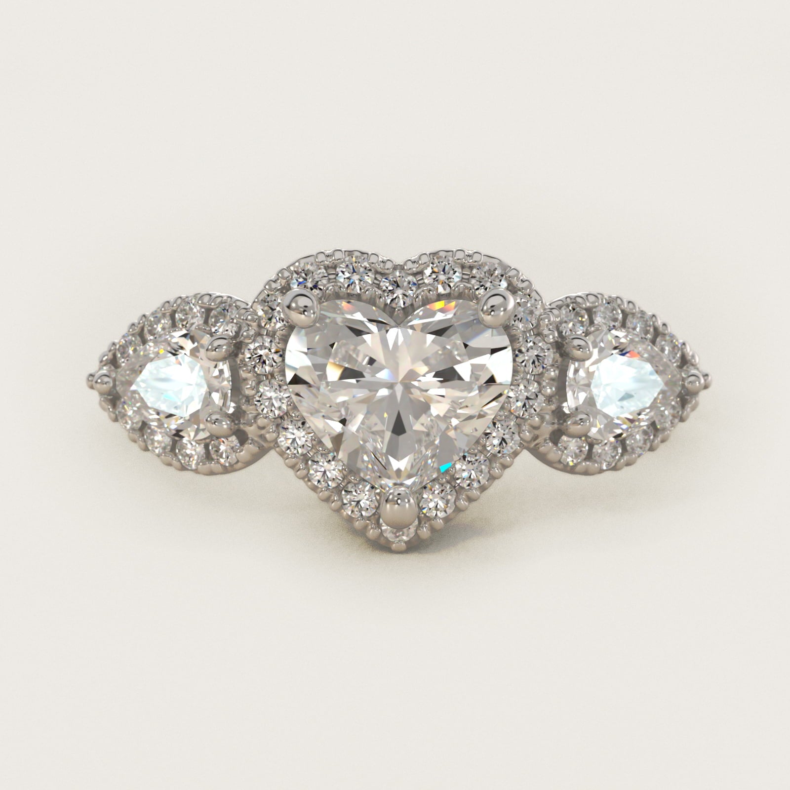 Three-Stone Pear Halo Diamond Engagement Ring in Platinum - Heart Center