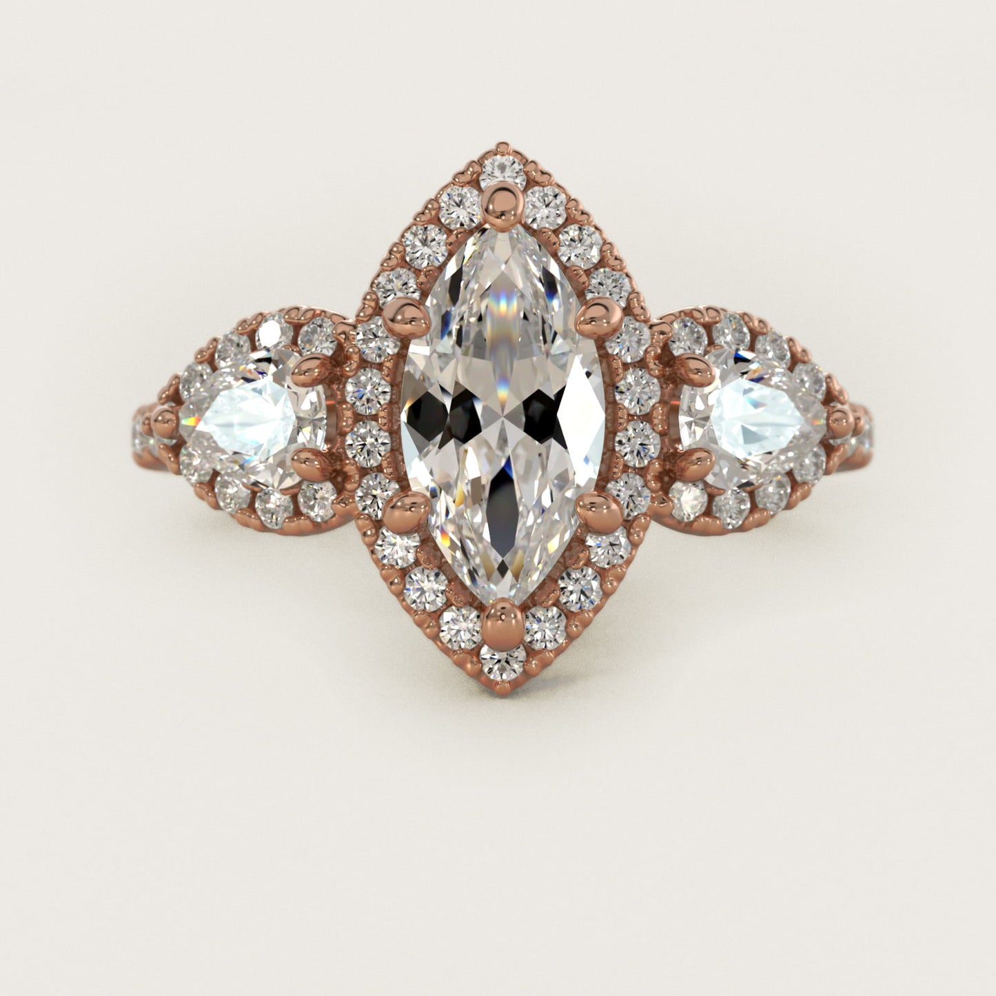 Three-Stone Pear Halo Diamond Engagement Ring in 14k Rose Gold - Marquise Center