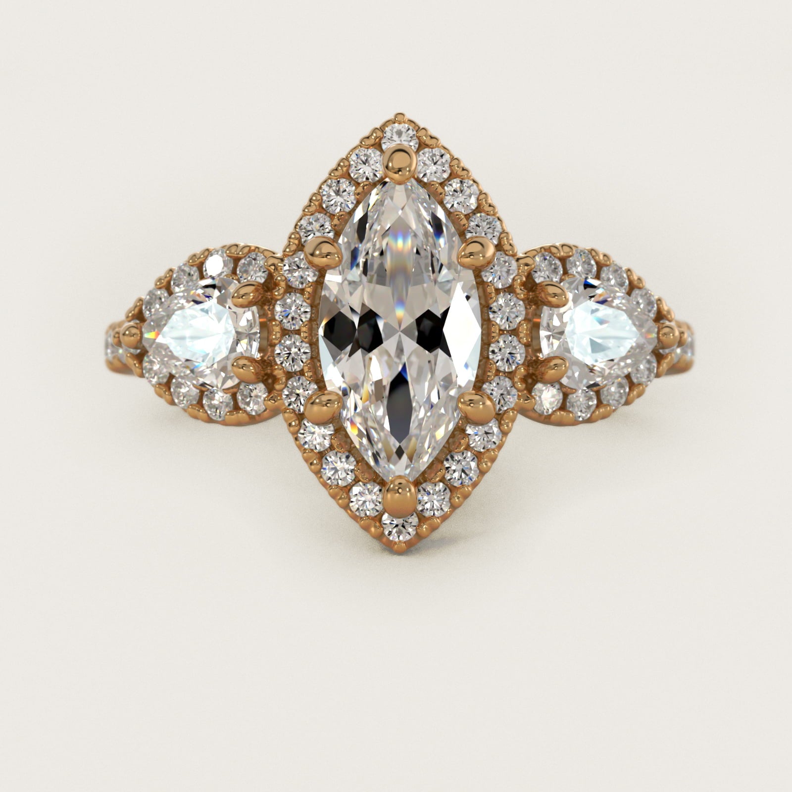 Three-Stone Pear Halo Diamond Engagement Ring in 14k Yellow Gold - Marquise Center