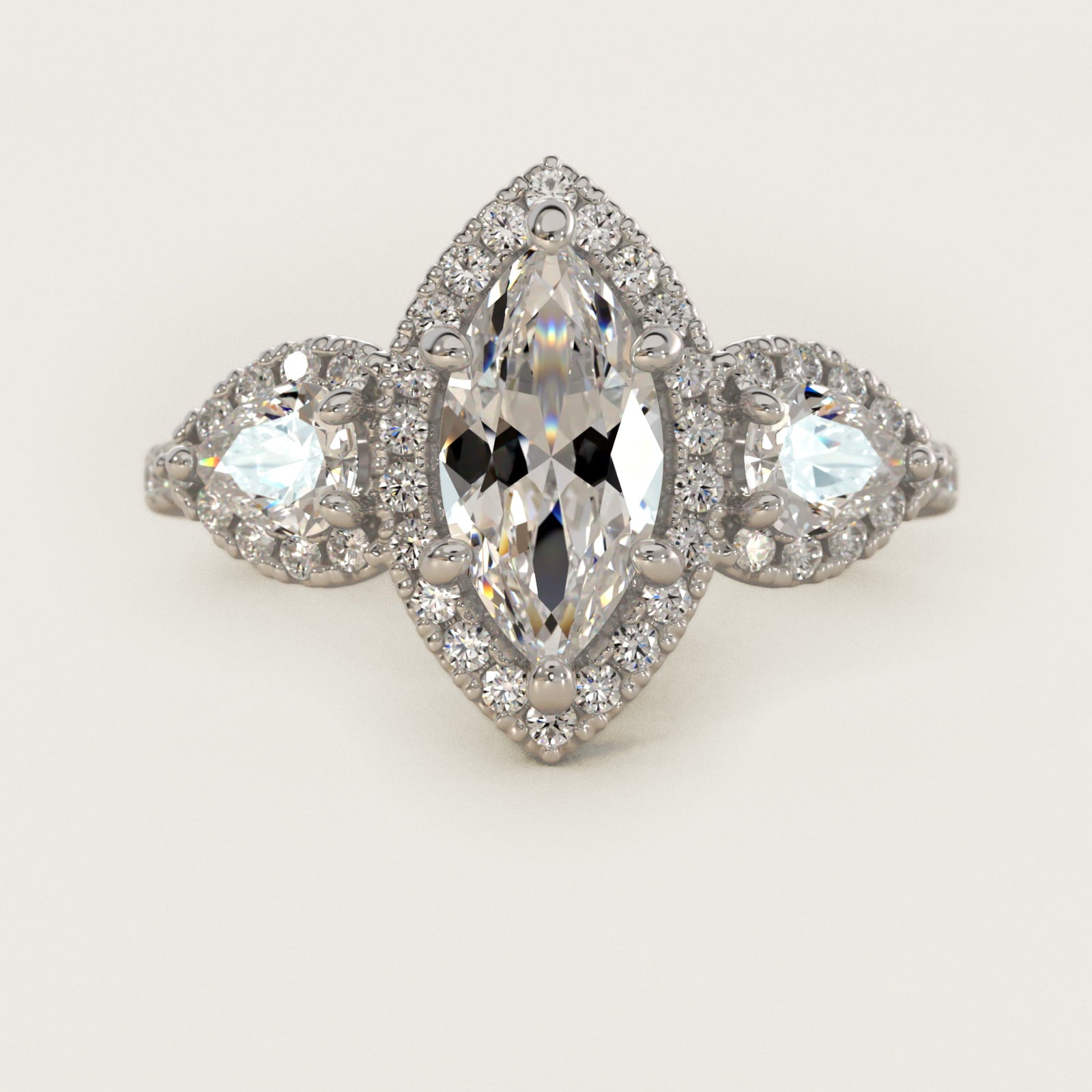 Three-Stone Pear Halo Diamond Engagement Ring in Platinum - Marquise Center
