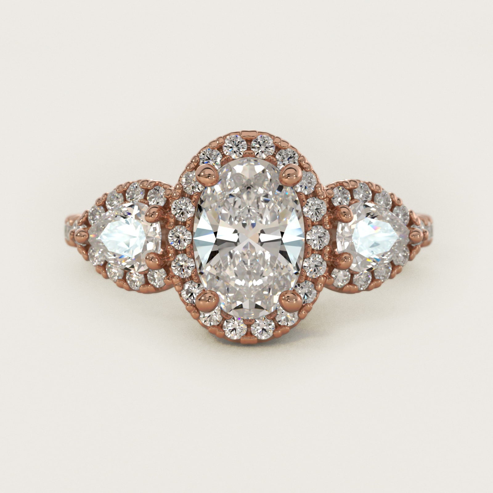 Three-Stone Pear Halo Diamond Engagement Ring in 18k Rose Gold - Oval Center
