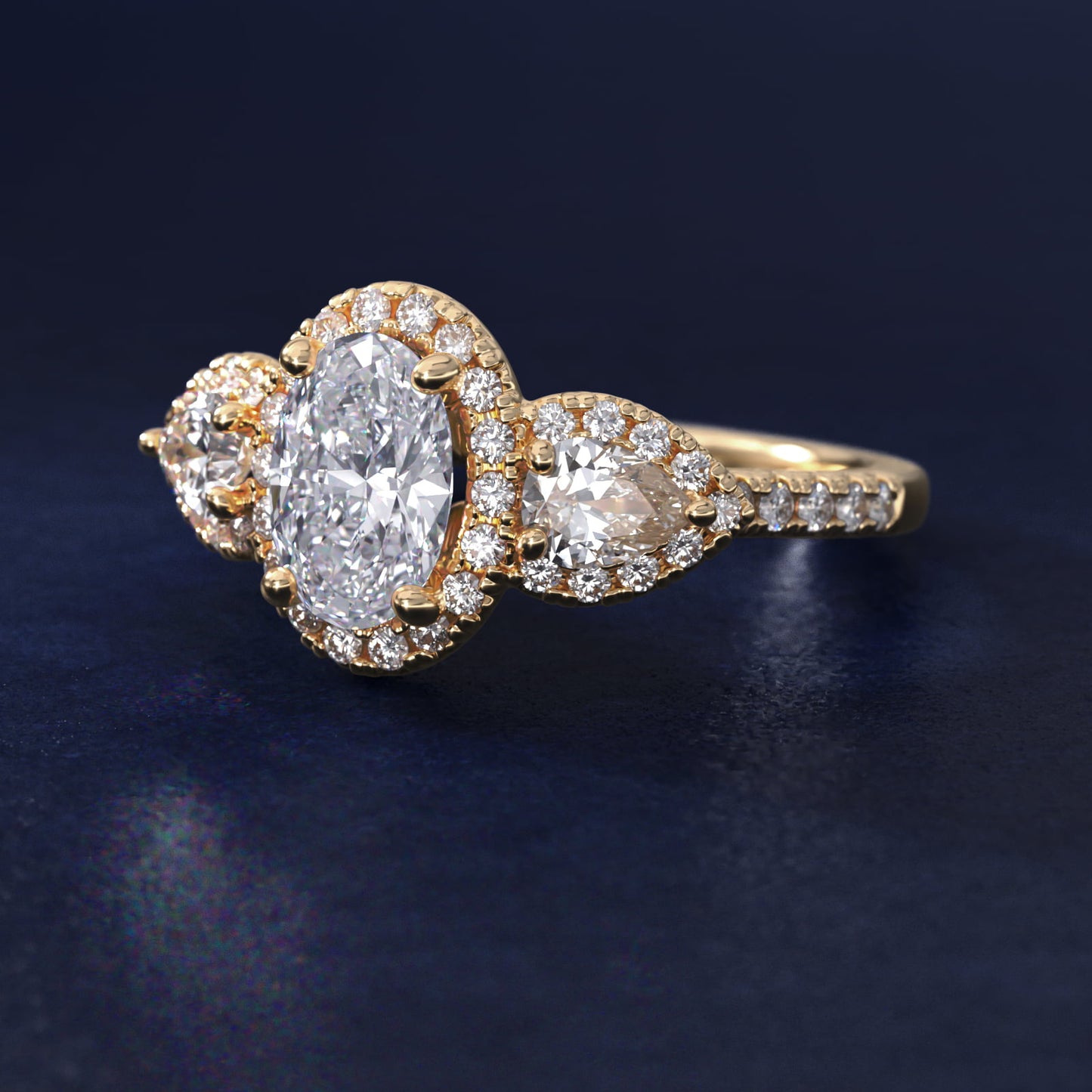 Three-Stone Pear Halo Diamond Engagement Ring in 14k Yellow Gold - Oval Center