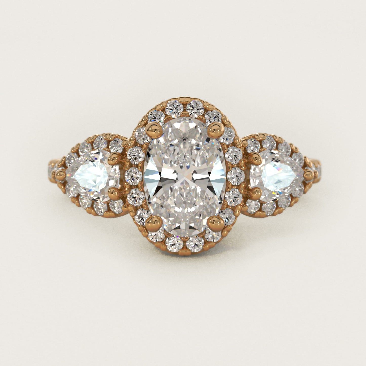Three-Stone Pear Halo Diamond Engagement Ring in 18k Yellow Gold - Oval Center