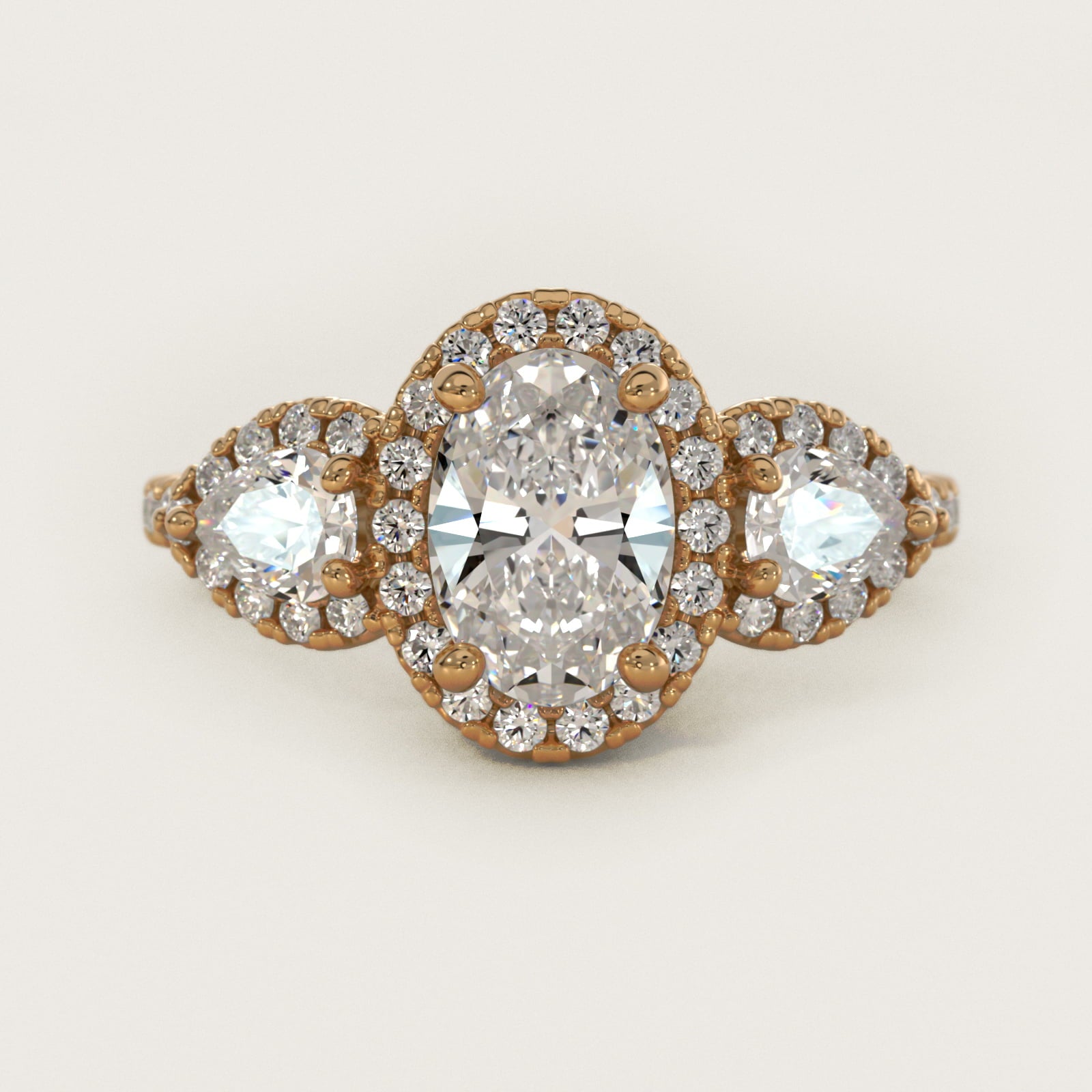 Three-Stone Pear Halo Diamond Engagement Ring in 18k Yellow Gold - Oval Center